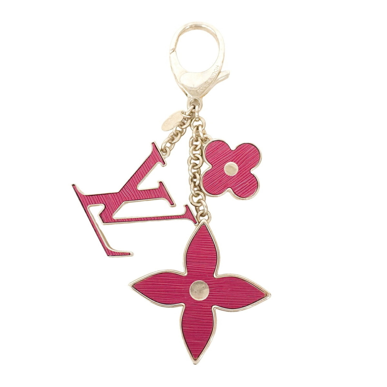 Keyring from Louis Vuitton: Keyring from Louis Vuitton The Louis Vuitton keyring boasts a striking purple hue paired with sleek silver accents, adding a touch of luxury to any outfit. Measuring 13.5cm in length, this elegant