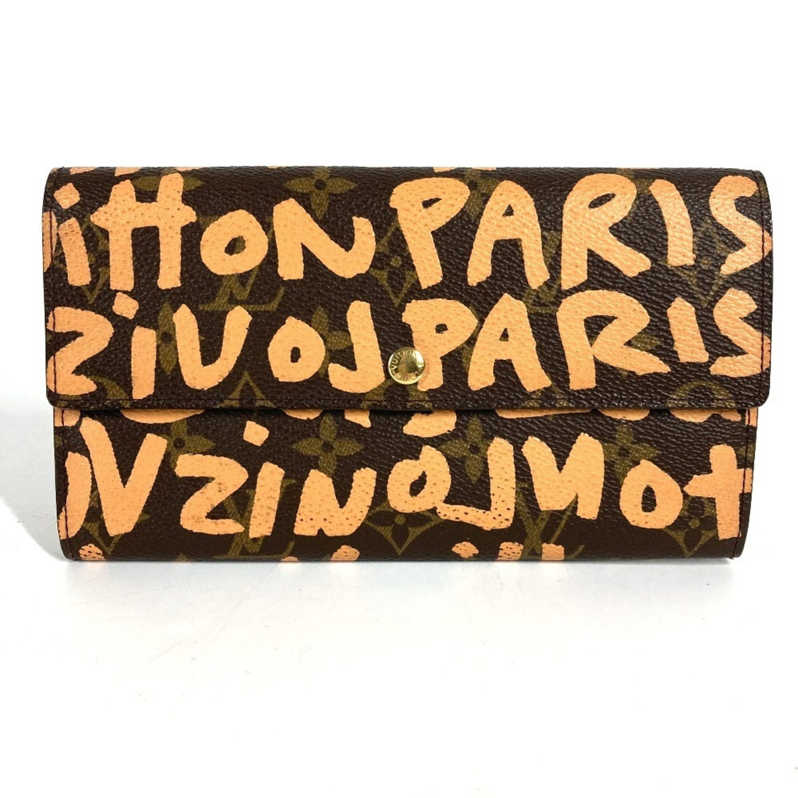 Long Wallet Louis Vuitton Monogram Graffiti Canvas Bi-Fold: Long Wallet Louis Vuitton Monogram Graffiti Canvas Bi-Fold The Long Wallet Louis Vuitton Monogram Graffiti Canvas Bi-Fold features a unique blend of style and design, with its iconic Monogram