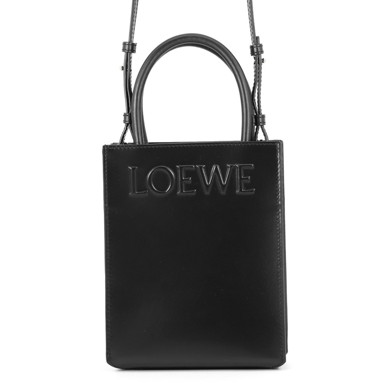 Handbag Leather Handbag: Handbag Leather Handbag Black leather handbag from Loewe, made with gold hardware and featuring an open closure. Measuring 21cm x 17cm x 5.5cm, it has a strap length of 99cm - 119cm. This handbag is m