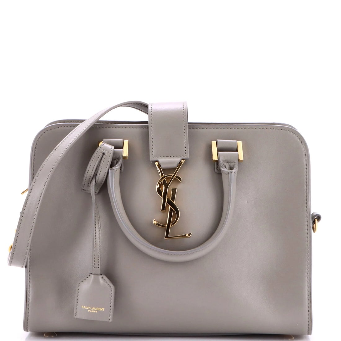 Cabas Leather Monogram Baby Saint: Cabas Leather Monogram Baby Saint This Saint Laurent Cabas Leather Monogram Baby Satchel boasts a sleek, gray exterior with a touch of sophistication. The bag's classic design is complemented by a