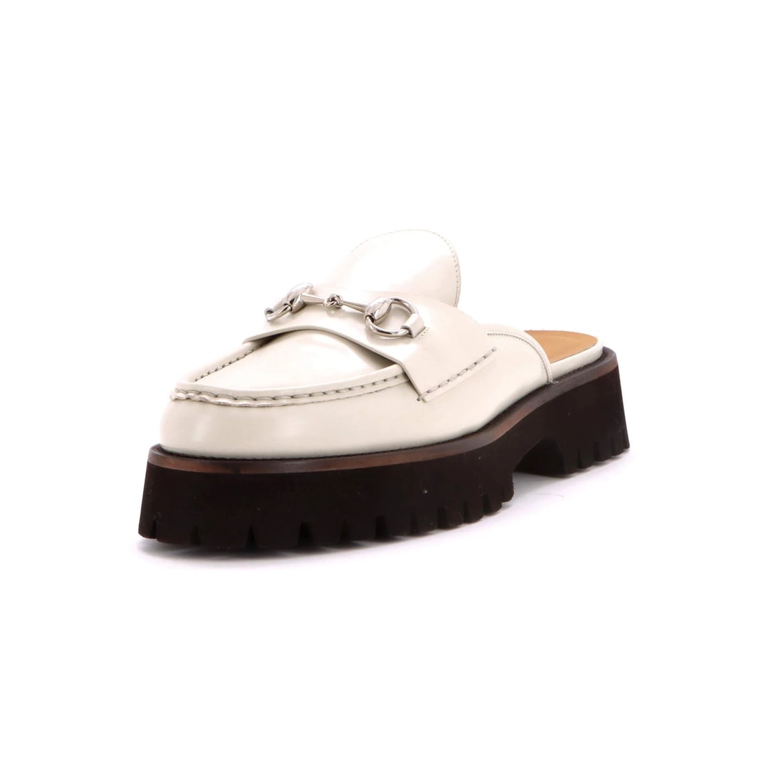 Women's Gucci Leather Horsebit Flatform Mules: Women's Gucci Leather Horsebit Flatform Mules White leather Gucci Horsebit Flatform Mules with a sleek, silver hardware and brown leather interior. Minor creases and scuffs add a touch of wear to