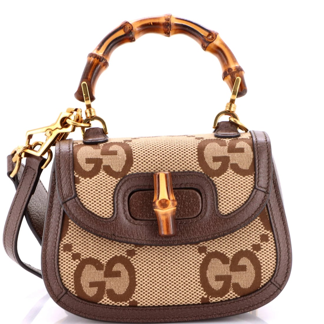 Gucci Bamboo GG Canvas 1947 Mini Jumbo Top Handle Bag: Gucci Bamboo GG Canvas 1947 Mini Jumbo Top Handle Bag The Gucci Bamboo GG Canvas 1947 Mini Jumbo Top Handle Bag features a unique combination of classic design and sustainable bamboo materials,