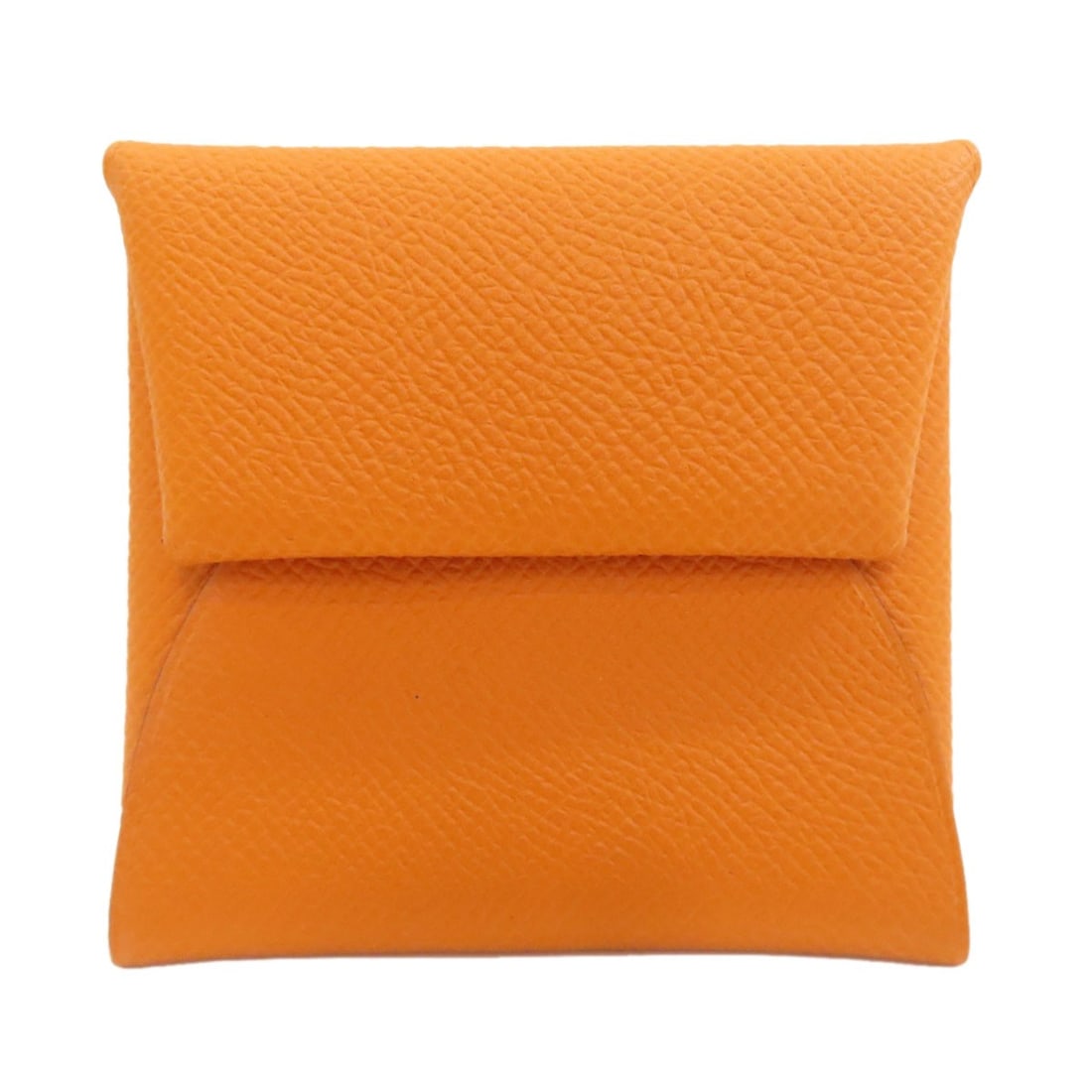 Hermes Bastia Silverhardware Coin Purse Epsom: Hermes Bastia Silverhardware Coin Purse Epsom Epsom coin purse from Hermes Bastia, featuring silver hardware and vibrant orange color. This stylish accessory showcases the brand's signature style