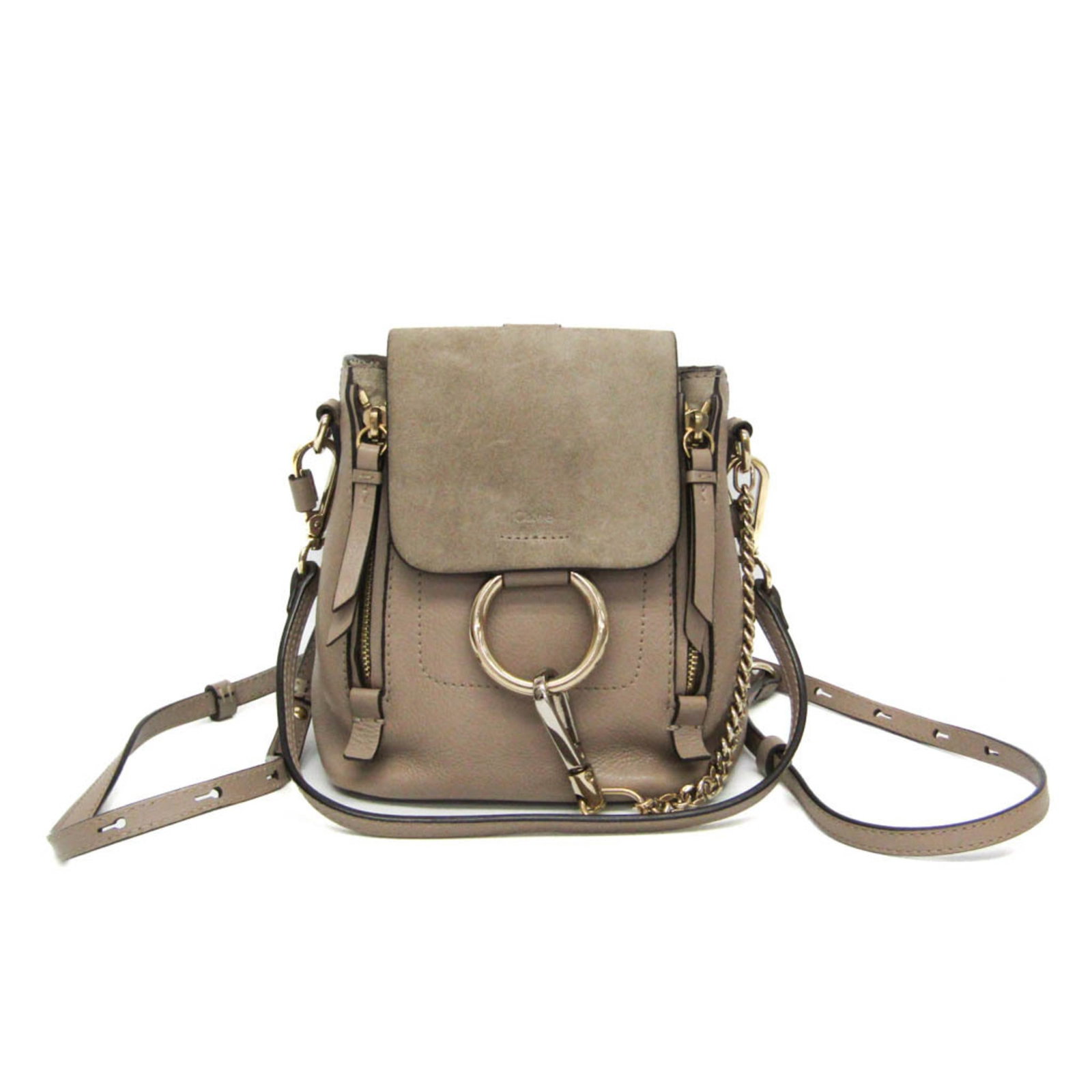 Leather Backpack Suede Chlo: Leather Backpack Suede Chlo The Chlo Faye Mini Country Backpack is a stylish and practical leather backpack with a suede finish, featuring a magnetic snap closure and an open pocket for added
