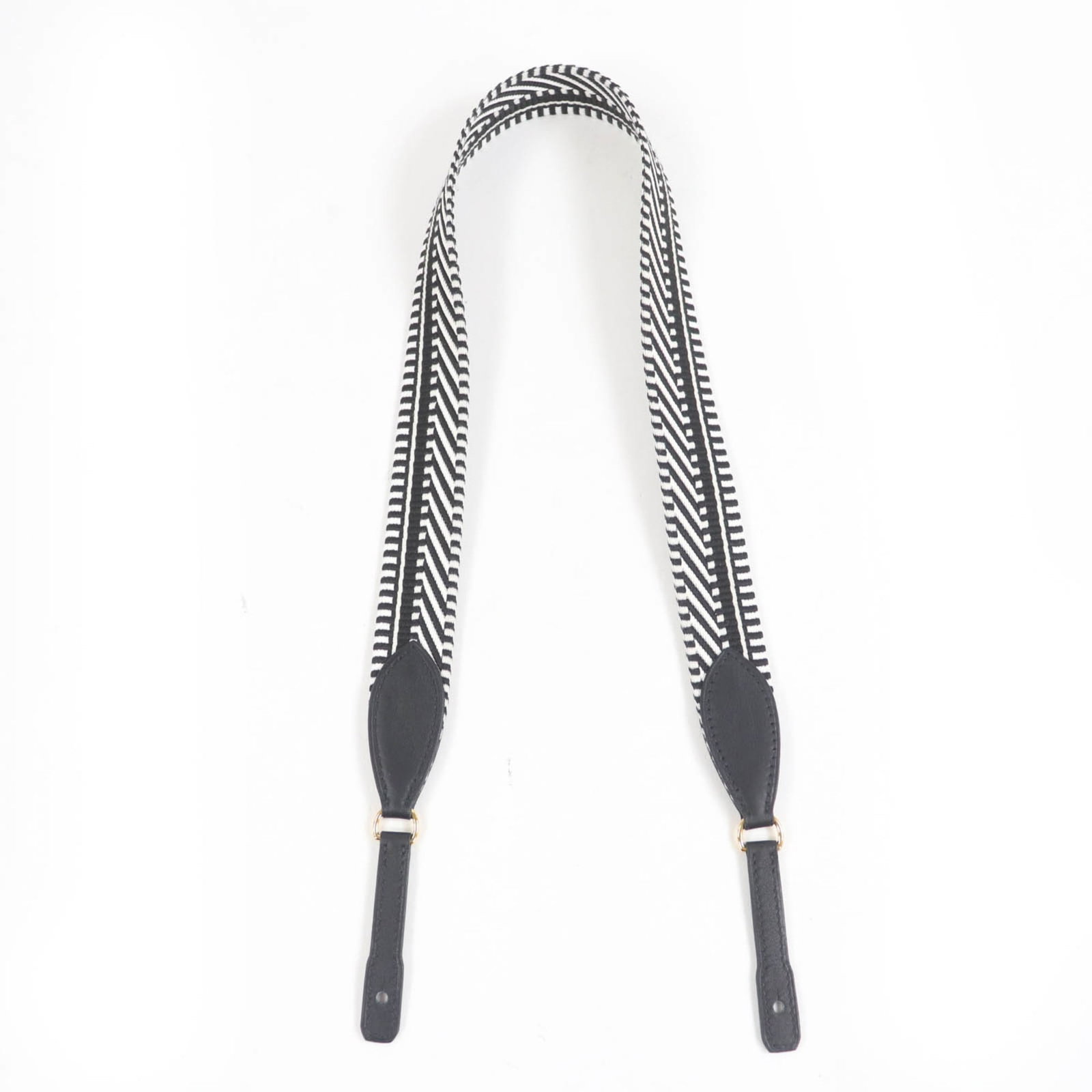 Hermes Strap Leather: Hermes Strap Leather Black leather strap from the renowned French brand Hermes, measuring 69cm in length, is complemented by a canvas material and finished with a dust bag for added protection. This