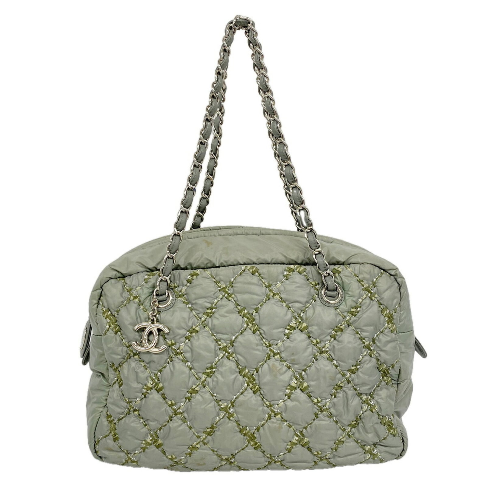 Nylon Tote Bag By Chanel: Nylon Tote Bag By Chanel Nylon tote bag by Chanel in green, featuring silver hardware and a size of 24cm x 34cm x 12cm. This stylish bag is made of nylon material and has a sleek, modern design. Item