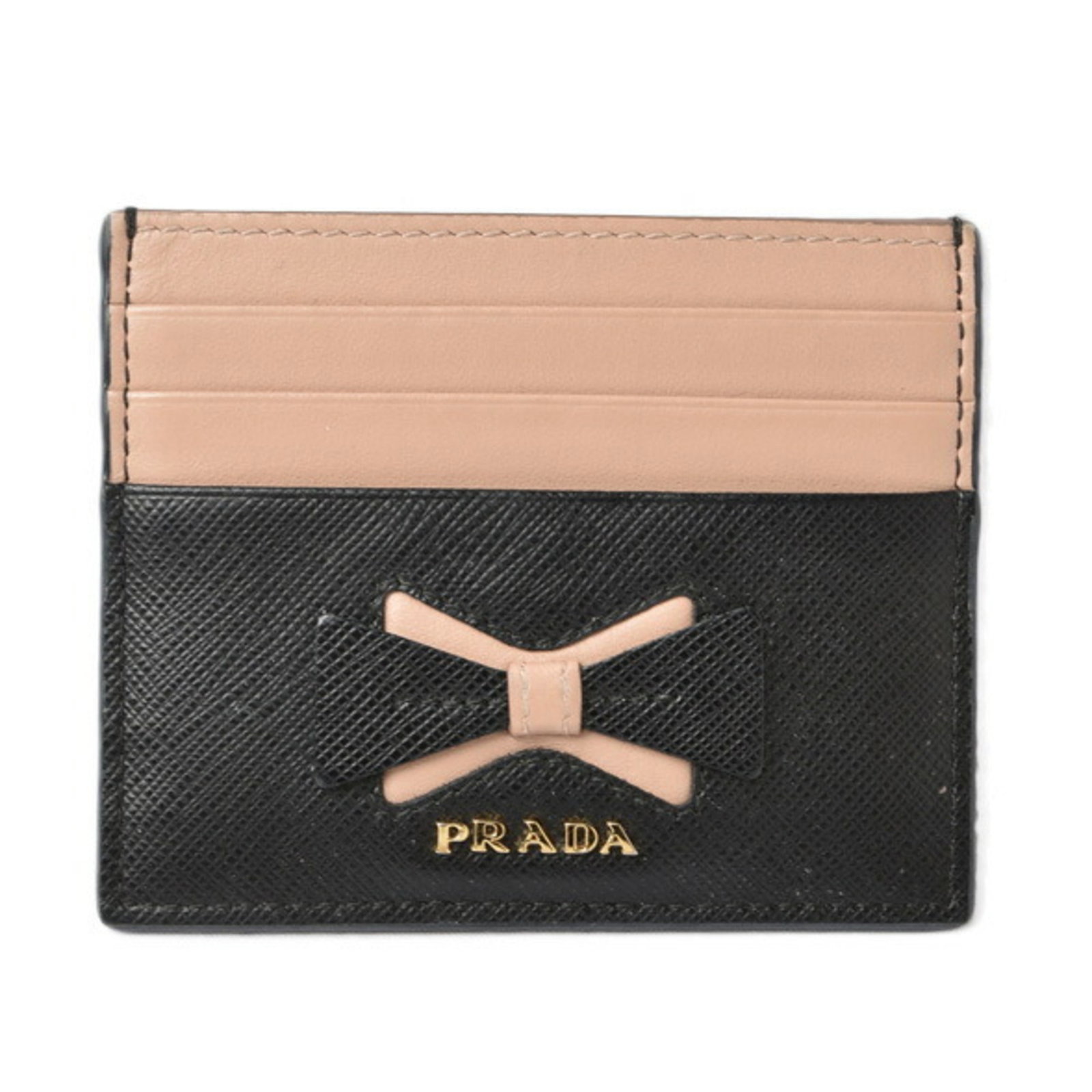 Card Case Saffiano by Prada: Card Case Saffiano by Prada Saffiano leather card case by Prada, featuring a sleek black design with a durable and water-resistant finish. Measuring 8cm x 10cm, this compact case is packaged in a