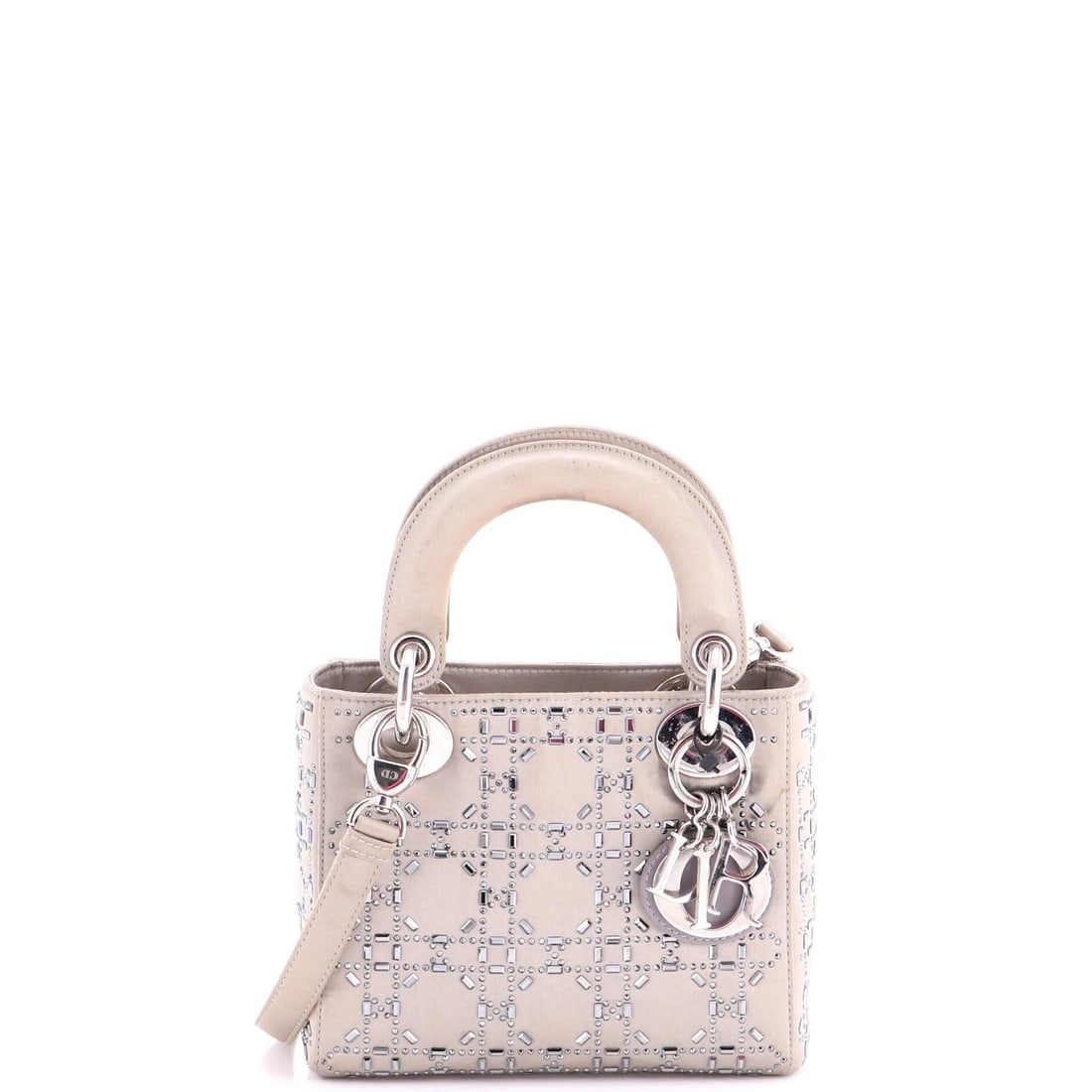Dior Lady Satin Cannage Crystal Bag Embellished Quilt Mini: Dior Lady Satin Cannage Crystal Bag Embellished Quilt Mini Satin exterior, crystal embellished, and quilted details make this mini Lady Dior bag a stylish and eye-catching accessory. Measuring 5.9" ta