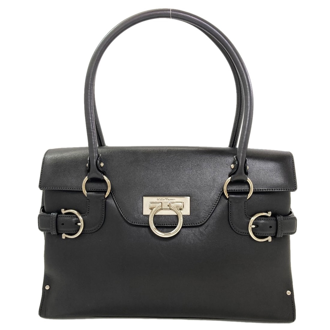 Salvatore Ferragamo Gancinihardware Tote Bag Leather: Salvatore Ferragamo Gancinihardware Tote Bag Leather Black leather Salvatore Ferragamo Gancini hardware tote bag. This stylish tote features a signature Gancini hardware detail, adding a touch of