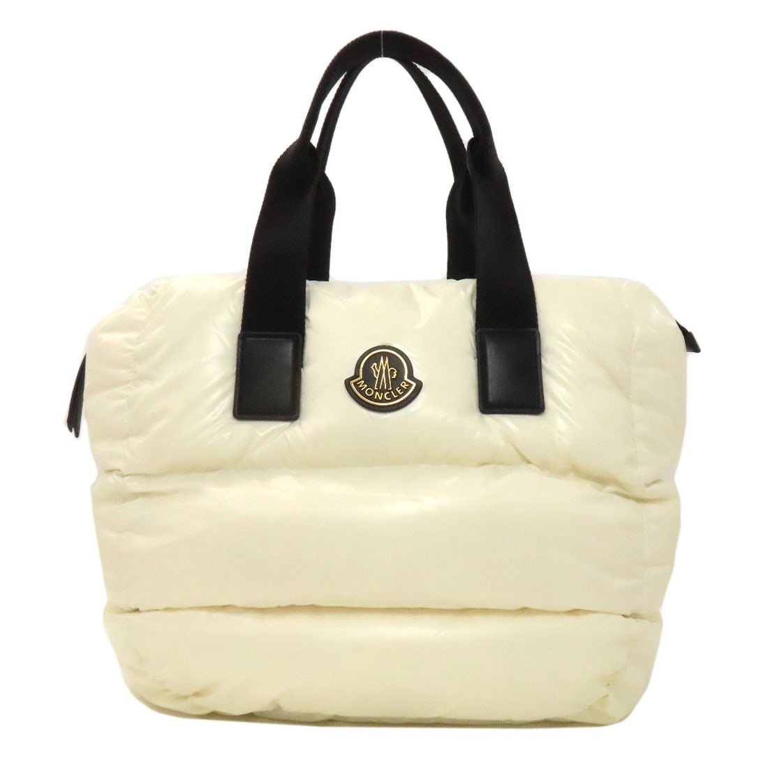 Moncler Caradoc Nylon Tote Bag: Moncler Caradoc Nylon Tote Bag White Moncler Caradoc nylon tote bag with a classic design. Made from high-quality nylon, this bag features a timeless style that's perfect for everyday use. Its simple
