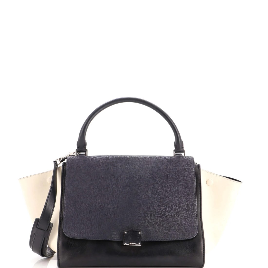 Medium leather Trapeze bag Celine: Medium leather Trapeze bag Celine Blue Celine Medium Leather Trapeze Bag with Suede Interior. This medium leather Trapeze bag features exposed piping, heavy scuffs, and cracking throughout, adding a