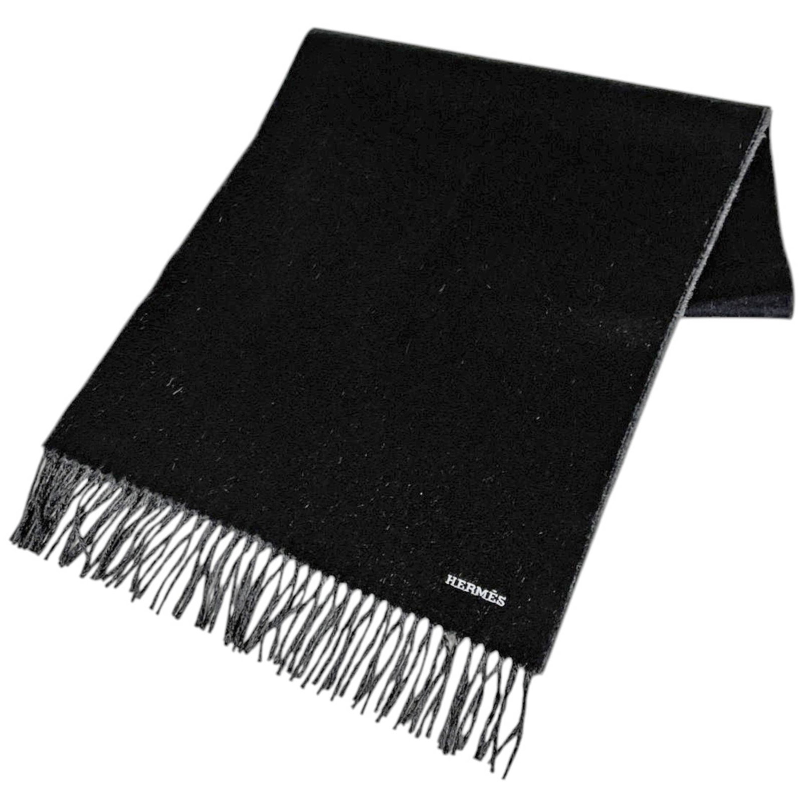 Hermes Stole Cashmere: Hermes Stole Cashmere The Hermes Stole Cashmere is a striking black cashmere stole, measuring 1.78m x 43cm, crafted from the finest cashmere material. Its elegant size and sleek design make it a
