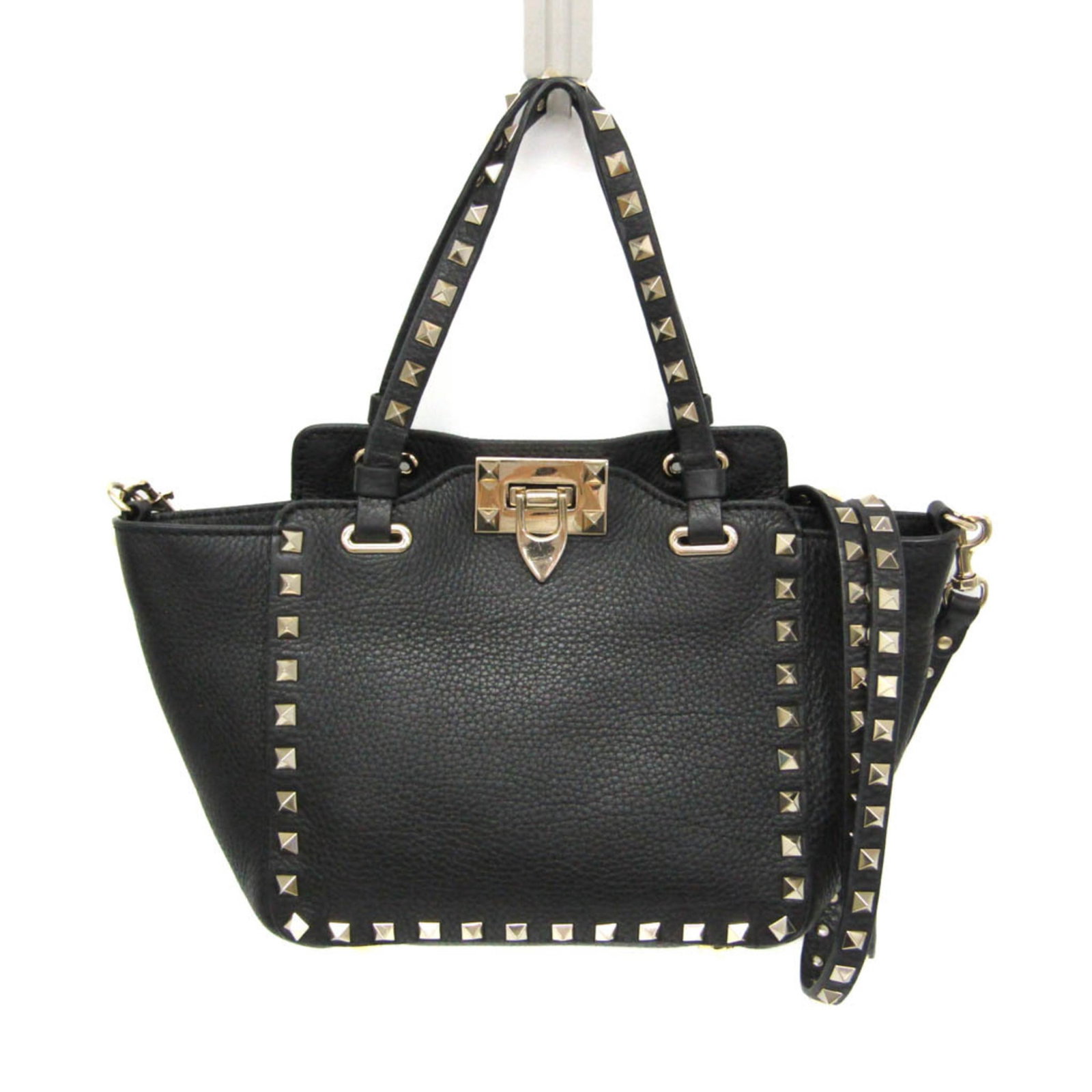 Garavani Valentino Handbag Leather Bag Shoulder: Garavani Valentino Handbag Leather Bag Shoulder Black leather Lock studs small shoulder bag from Valentino Garavani, featuring a 30cm opening/closing section, zipper pocket, and adjustable strap of 11