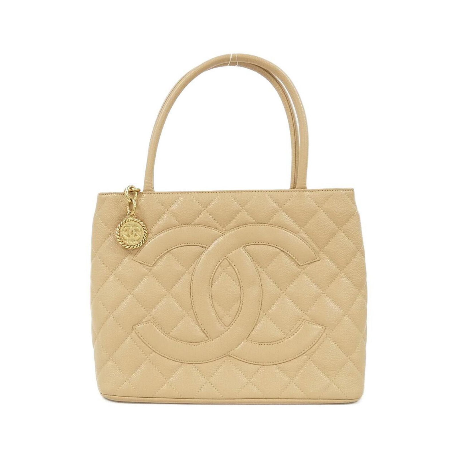 Calfskin Handbag Chanel: Calfskin Handbag Chanel Calfskin Handbag Chanel - A Timeless Beige Classic25cm x 30cm x 14cm in size, this Chanel handbag boasts a striking beige color and is crafted from high-quality grained