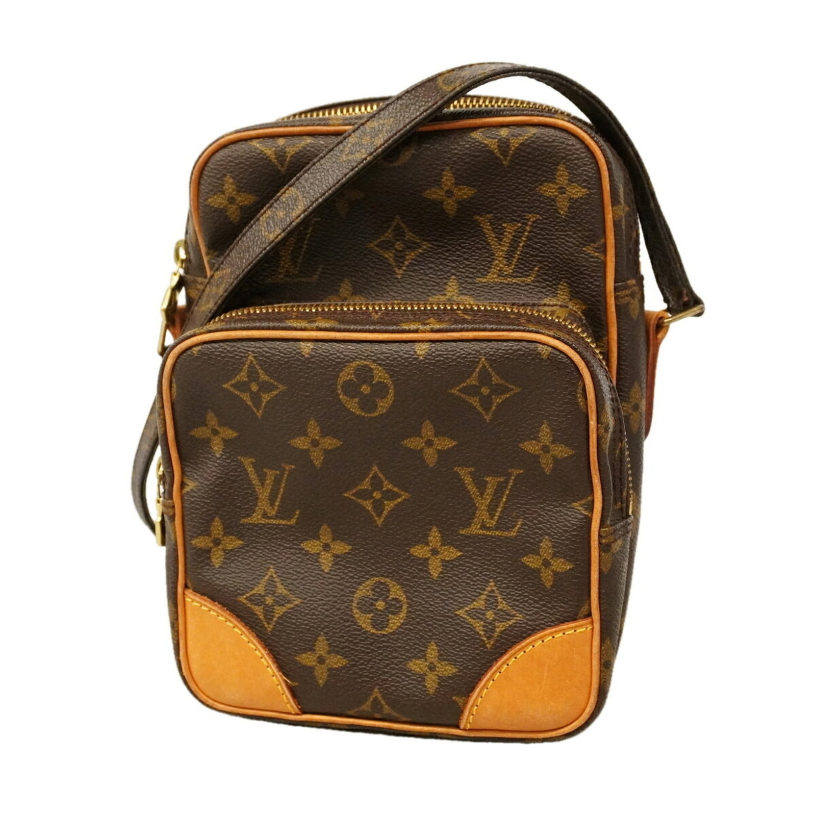 Shoulder Bag by Louis Vuitton: Shoulder Bag by Louis Vuitton Brown Louis Vuitton shoulder bag with dimensions 21cm x 15cm x 9cm. This stylish bag features a classic design with a signature LV monogram pattern. Made from