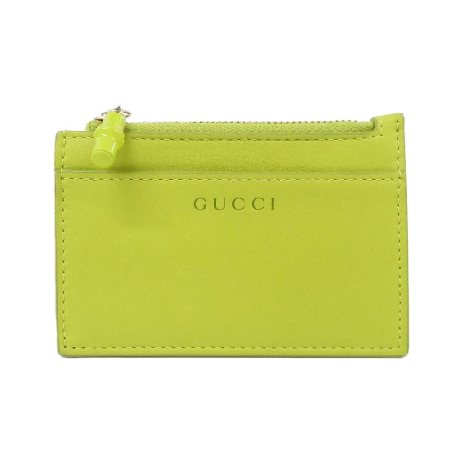 Coin purse leather case Gucci: Coin purse leather case Gucci The Gucci coin purse leather case boasts a striking green color and sleek design, measuring 7.5cm x 11cm x 1cm. Made from high-quality leather, this compact case is perfe