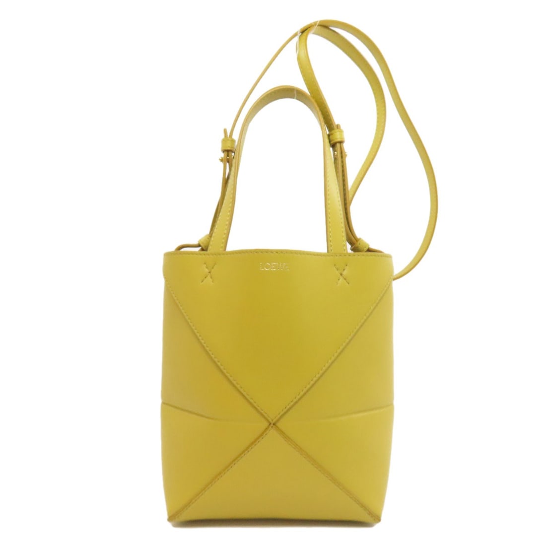 Puzzle Calf Fold Loewe 2Way Handbag: Puzzle Calf Fold Loewe 2Way Handbag Item Specifics: Brand: LOEWE Style: Handbag Color: yellow Type: Handbag Exterior Color: yellow Exterior Material: Calf Product Disclaimer: Pre-owned unless stated.