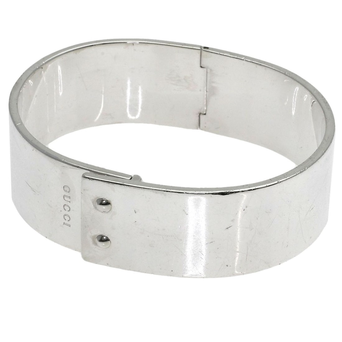 Gucci Logo Bangle Silver: Gucci Logo Bangle Silver Silver Gucci Logo Bangle is a sleek and modern bracelet featuring the iconic Gucci logo. Made from high-quality silver metal, this bangle boasts a sophisticated design that ad