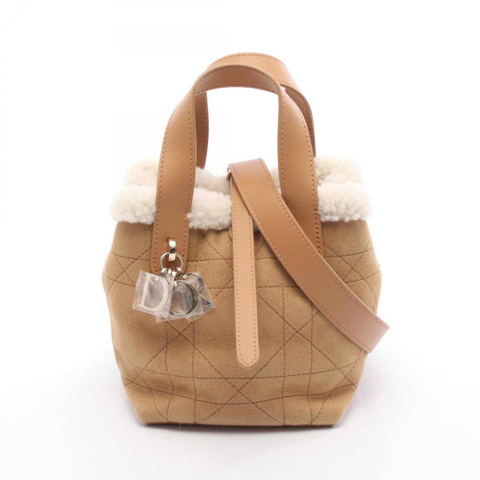 Handbag Leather Dior Christian: Handbag Leather Dior Christian This luxurious handbag features a rich brown and white Mouton leather design, showcasing the iconic style of Christian Dior. With its sleek shape and sturdy shoulder