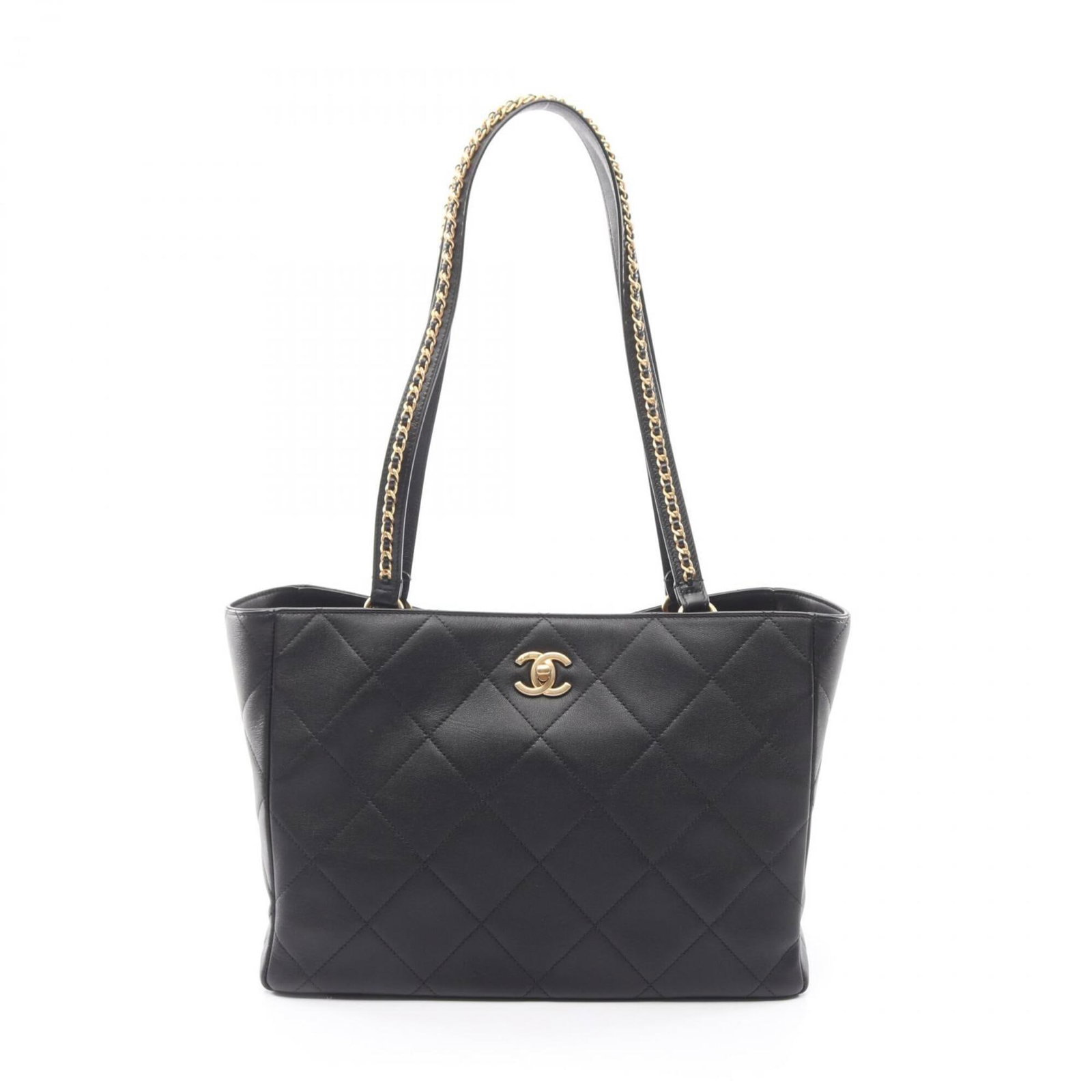 Chanel Handbag Leather Tote: Chanel Handbag Leather Tote Black leather Chanel handbag tote with gold hardware, measuring 23cm x 32cm x 13cm. This classic design showcases the timeless elegance of Chanel's signature style. Made fr