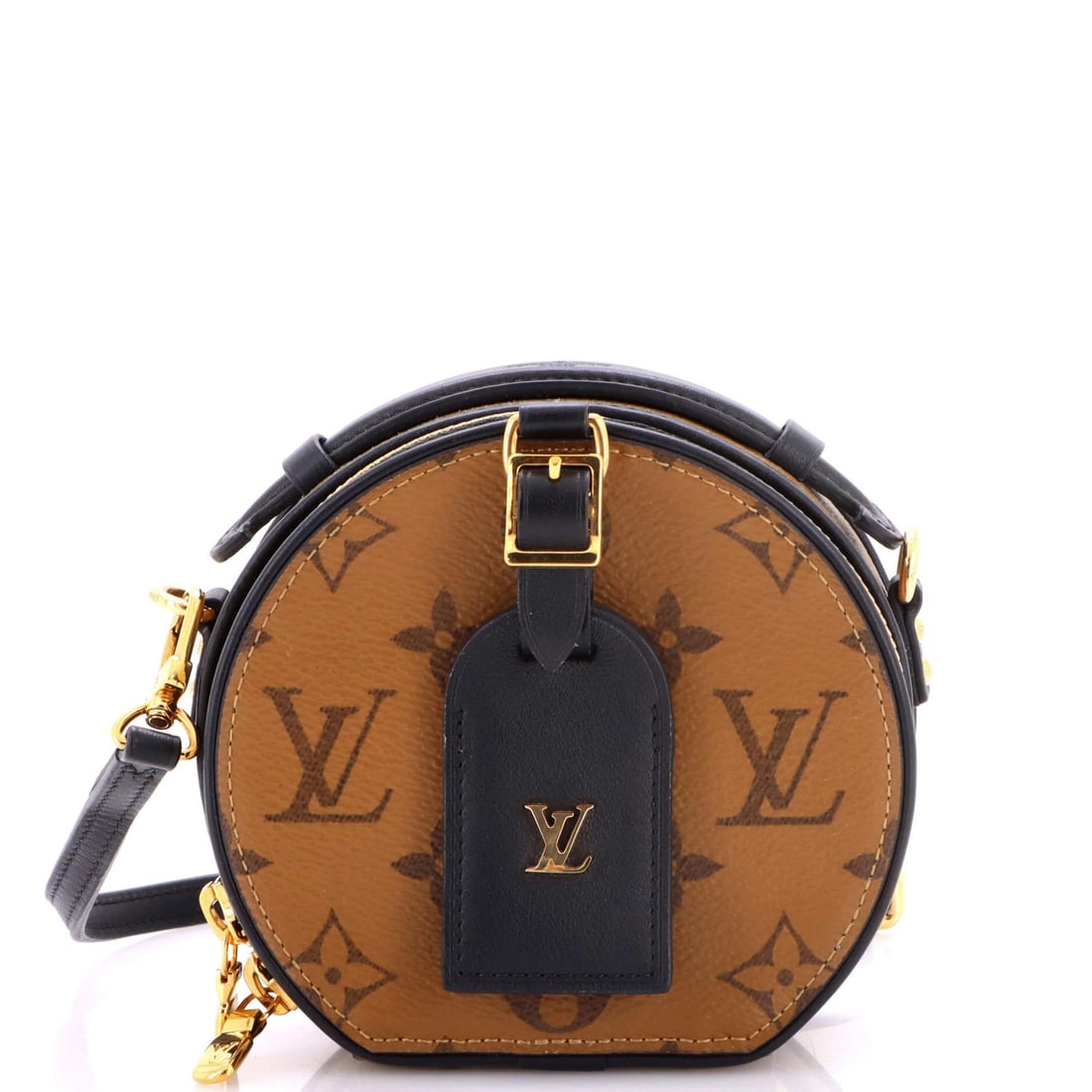 Mini Boite Louis Vuitton Reverse Canvas Monogram Bag: Mini Boite Louis Vuitton Reverse Canvas Monogram Bag The Mini Boite Louis Vuitton Reverse Canvas Monogram Bag boasts a rich, brown canvas exterior adorned with the iconic Louis Vuitton Reverse Monogra