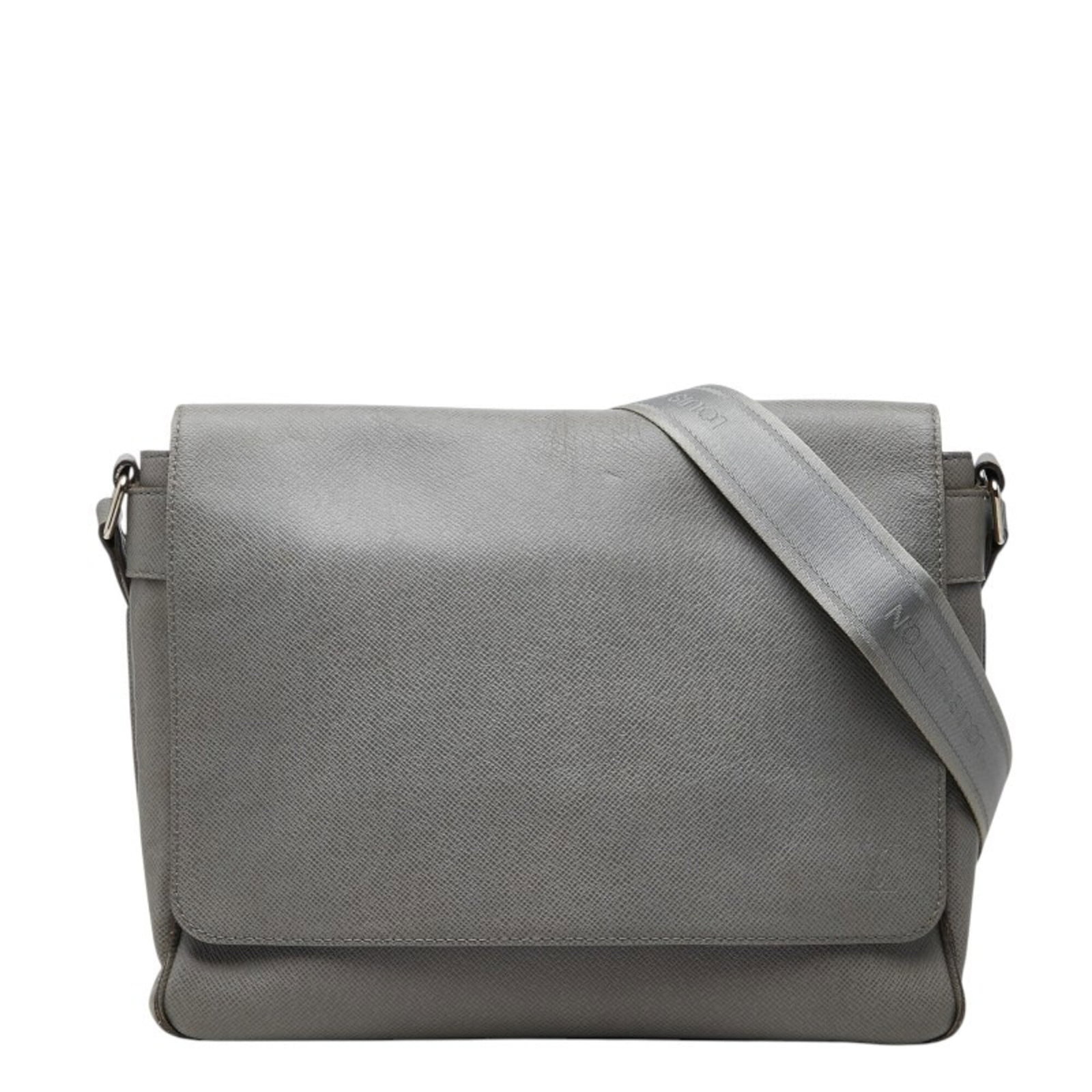 Shoulder Bag Leather Louis Vuitton: Shoulder Bag Leather Louis Vuitton Glacier, Gray Leather Louis Vuitton Shoulder Bag. This shoulder bag features a Glacier, Gray Leather material with dimensions of 28cm x 32cm x 9cm. The bag's