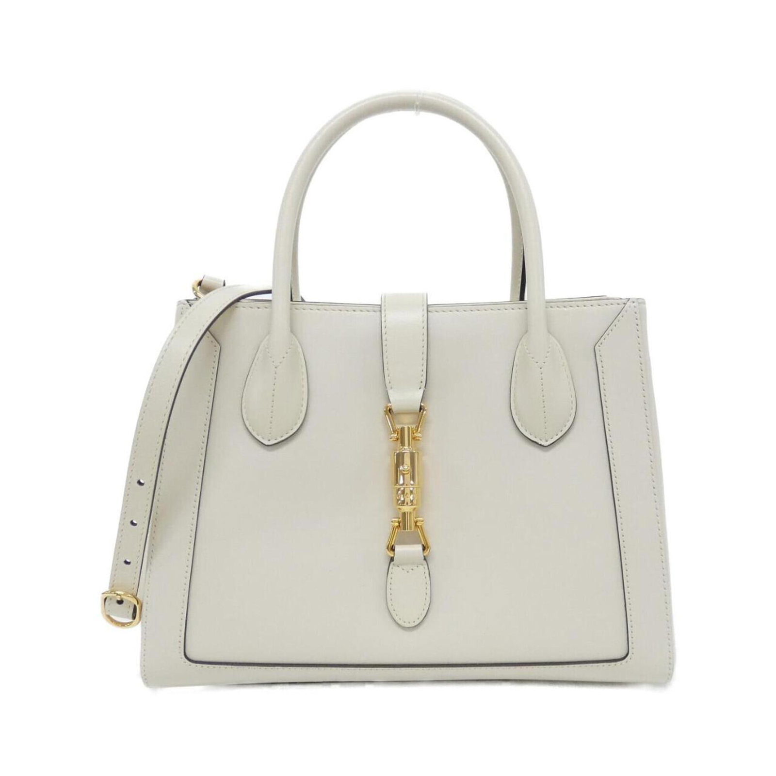 Handbag Leather Gucci: Handbag Leather Gucci The Gucci handbag boasts a striking off-white and white leather exterior, measuring 23cm x 30cm x 11cm. Its classic design and premium leather construction make it a timeless add