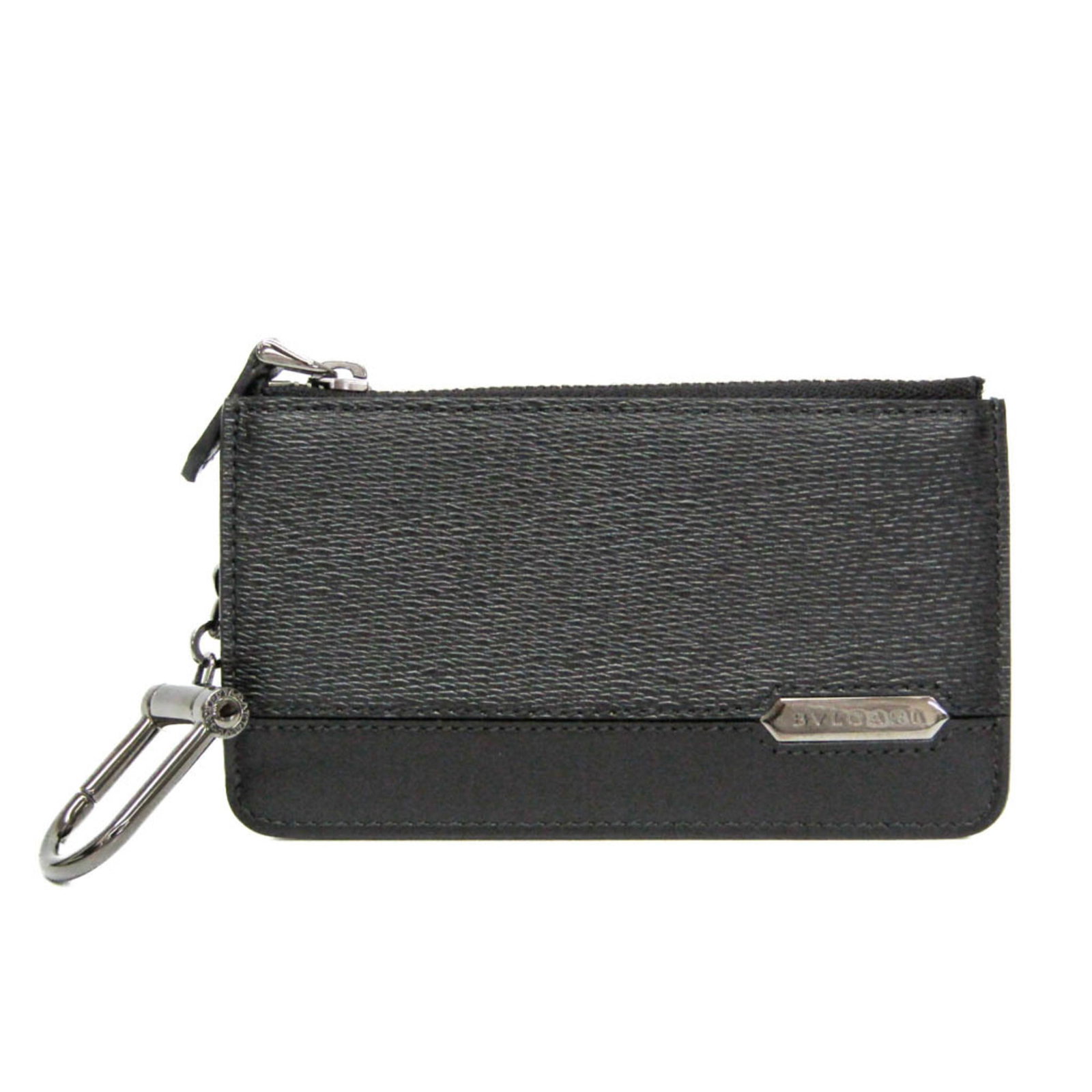 Bvlgari leather keycase: Bvlgari leather keycase Bvlgari's Scaglie Man 282774 Coin Case is a sleek and sophisticated leather keycase, crafted from high-quality black leather. The compact design features a coin purse/coin case