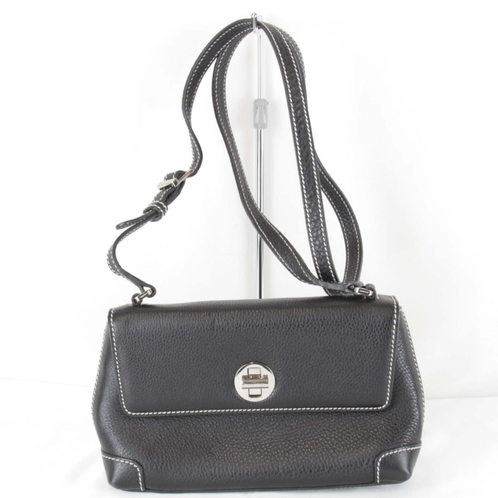 Shoulder Bag Leather: Shoulder Bag Leather Black leather shoulder bag from Italy, measuring 14cm x 24cm x 6cm, with a classic design that makes it a timeless accessory. The bag's sleek black color and high-quality leather