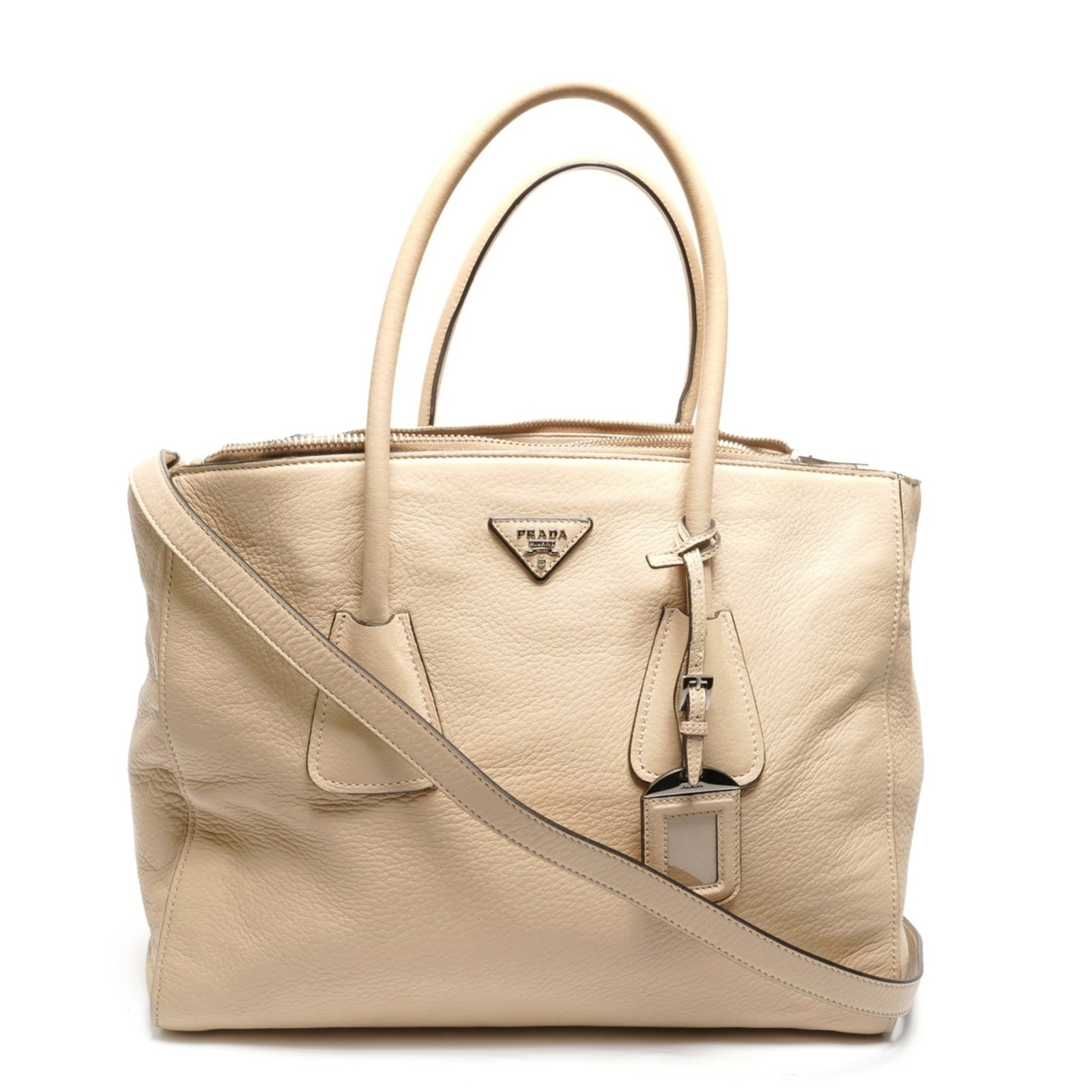 Leather Prada Tote Bag: Leather Prada Tote Bag Prada's iconic tote bag boasts a rich beige leather exterior, complemented by a sturdy 30cm x 52cm x 15cm design. The bag's sleek lines and classic silhouette make it a