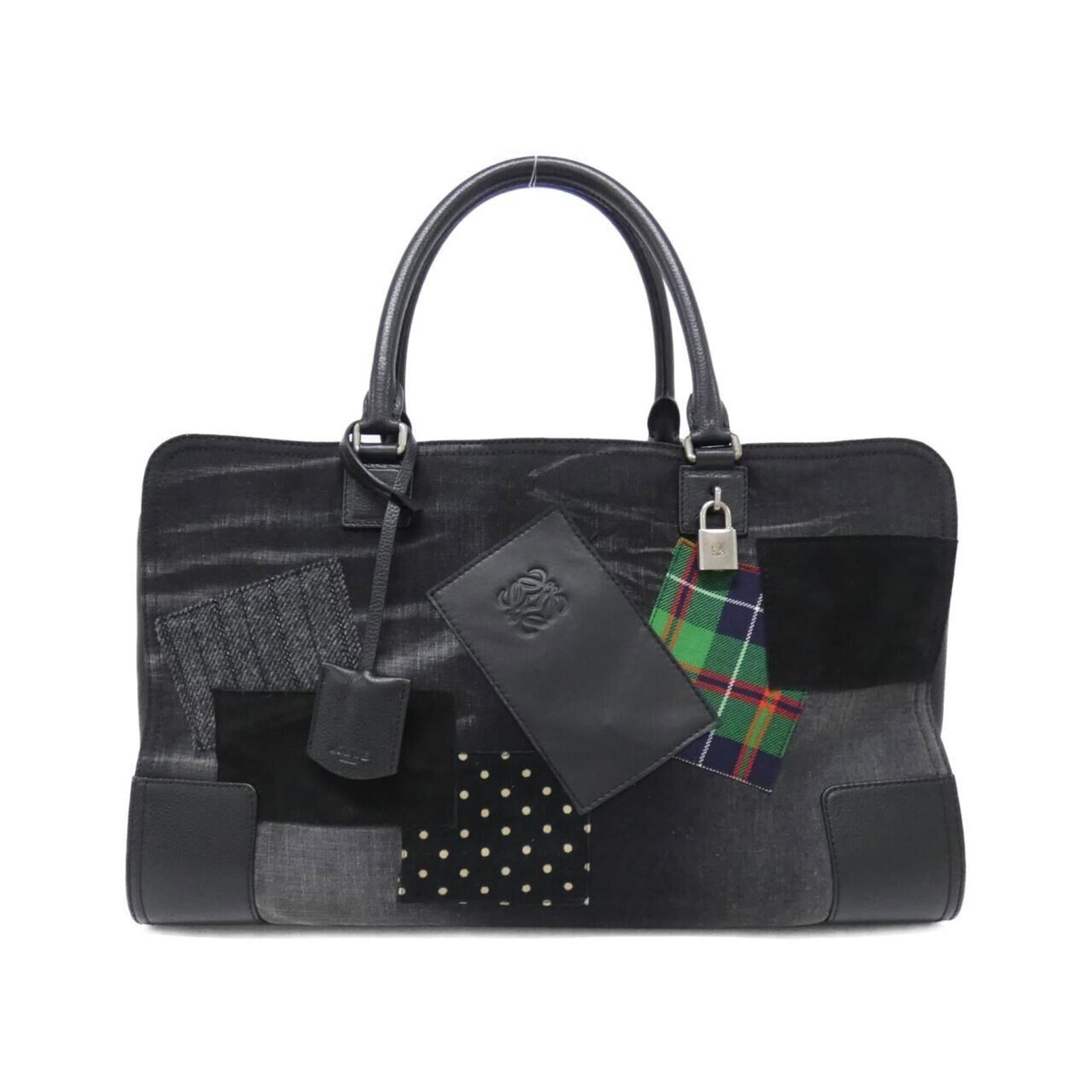Handbag Leather Denim Canvas: Handbag Leather Denim Canvas This unique handbag combines three distinct materials: luxurious leather, rugged denim, and canvas, creating a visually striking design. Measuring 28cm x 44cm x 18cm, it o
