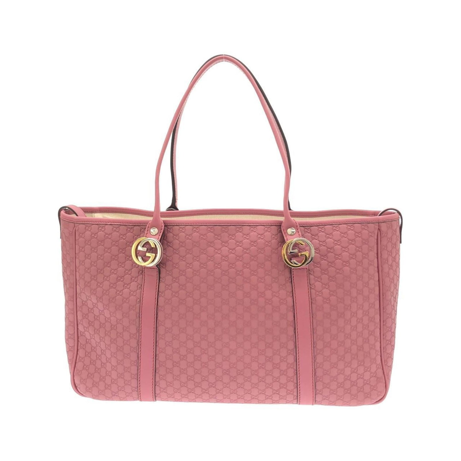 Gucci Micro Leather Handbag: Gucci Micro Leather Handbag Micro GG leather provides a sleek, modern look in this pink Gucci handbag, measuring 23cm x 36cm x 10cm. The signature Gucci design is evident in every detail, from the