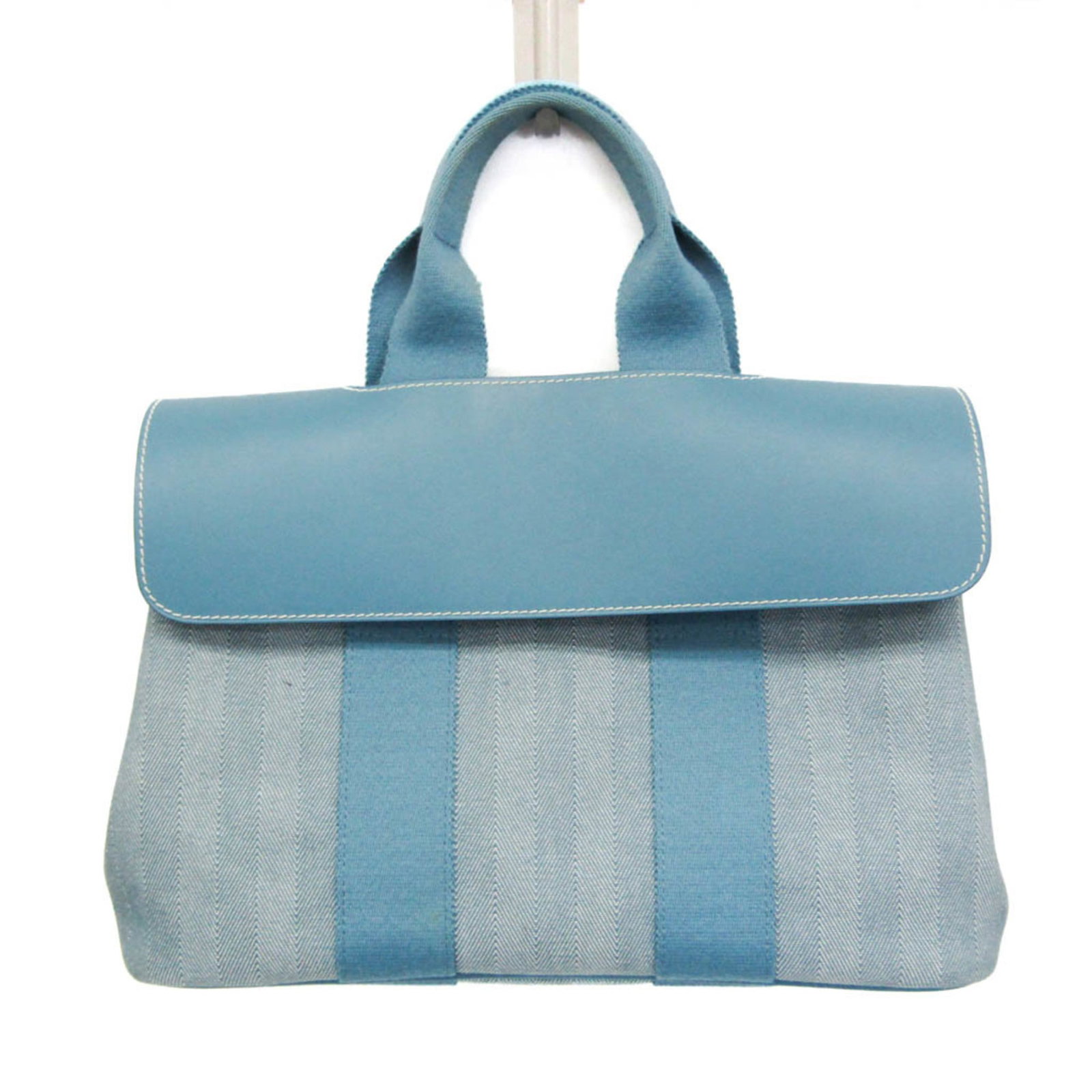 Hermes Handbag Cotton Polyester Leather: Hermes Handbag Cotton Polyester Leather Cotton, polyester, and leather come together in this unique Valparaiso handbag from the iconic Hermes line, featuring a striking blue color and a spacious open