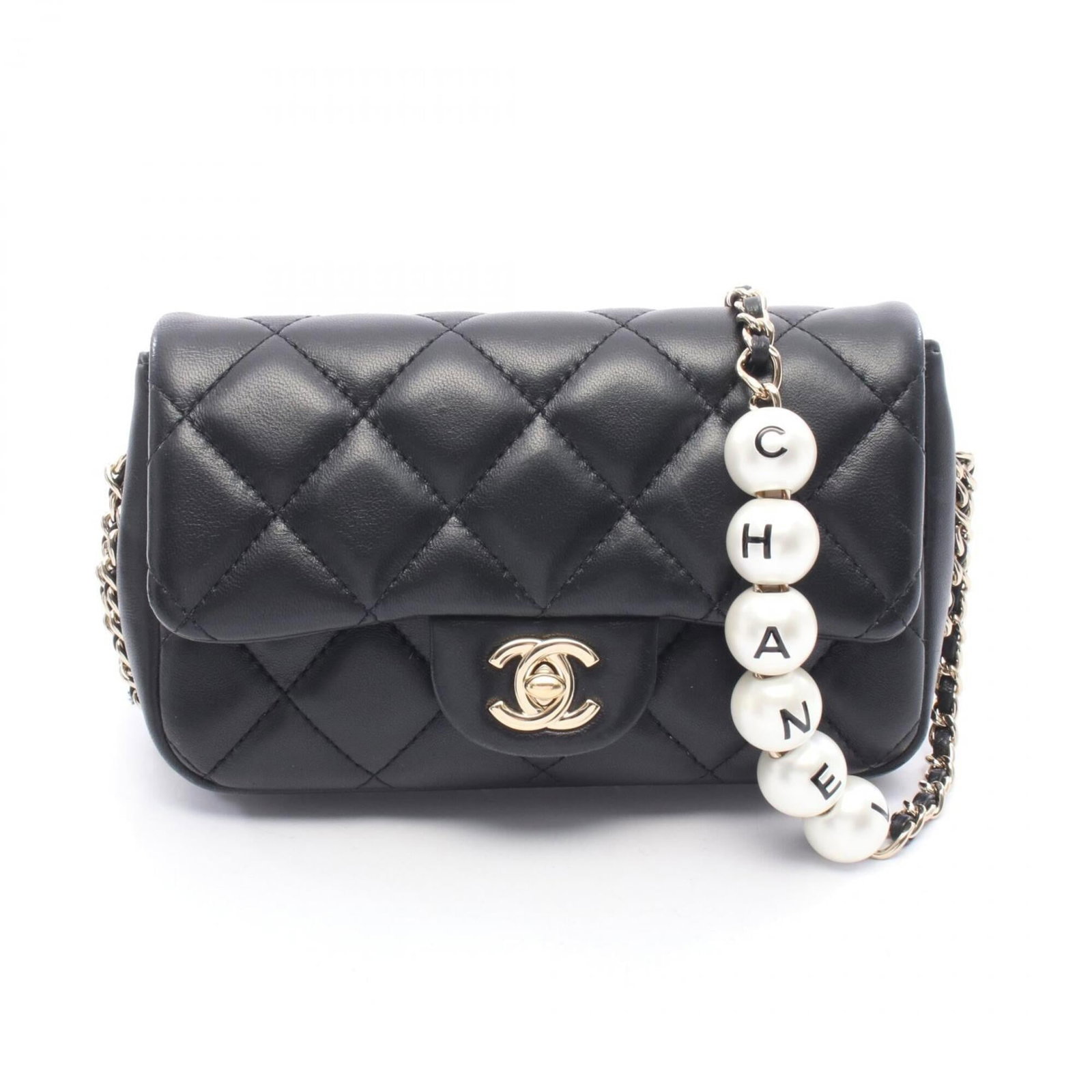 Shoulder Bag Leather Handbag Chanel: Shoulder Bag Leather Handbag Chanel The Chanel Shoulder Bag Leather Handbag is a sleek and sophisticated accessory, crafted from high-quality lambskin leather in a classic black finish. Its gold hardw