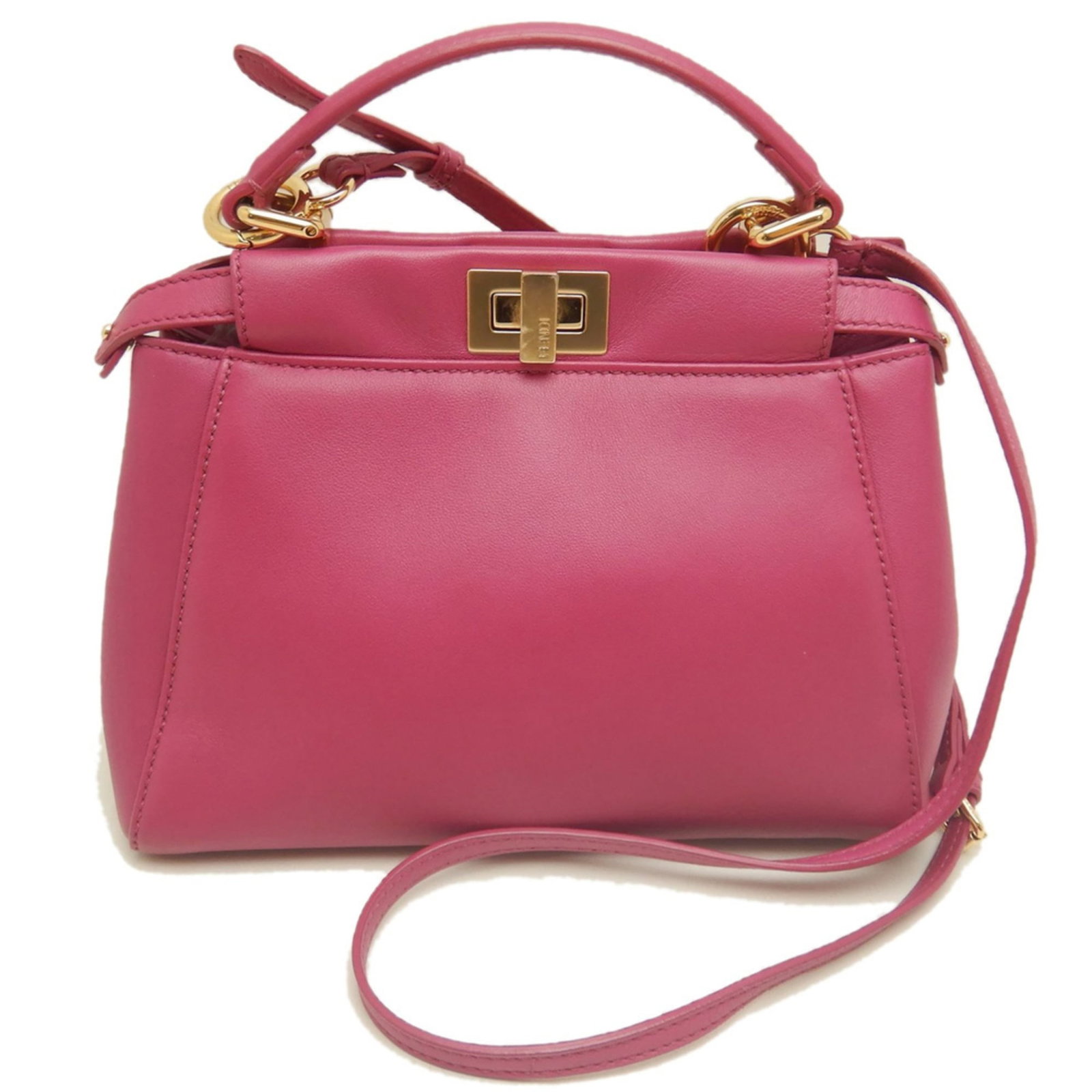 Handbag Leather Fendi: Handbag Leather Fendi Pink Fendi handbag made from high-quality leather, featuring a distinctive calfskin material. The bag measures 18cm x 23cm x 11cm and boasts a classic design. This stylish access