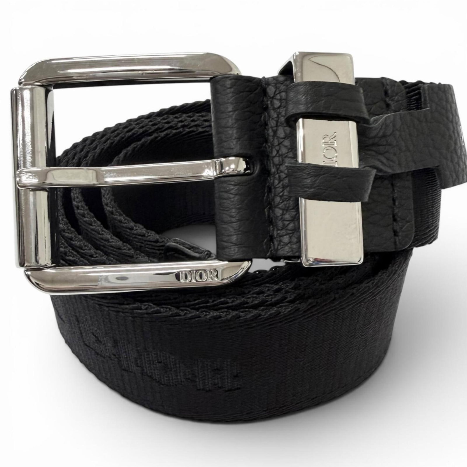 Standard Dior Homme Belt: Standard Dior Homme Belt The Dior Homme Standard Belt is a sleek and sophisticated accessory, crafted in Italy with a classic black finish. Its adjustable length ensures a comfortable fit for 97cm - 1
