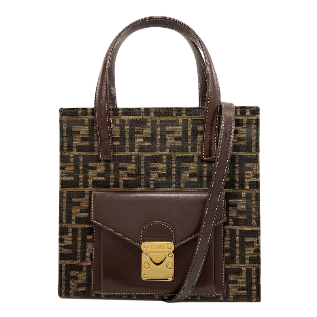 Handbag Canvas Leather Zucca Pattern 2Way Fendi: Handbag Canvas Leather Zucca Pattern 2Way Fendi Canvas and leather come together in this unique Fendi handbag, featuring a distinctive Zucca pattern and a 2-way design. The brown canvas exterior adds