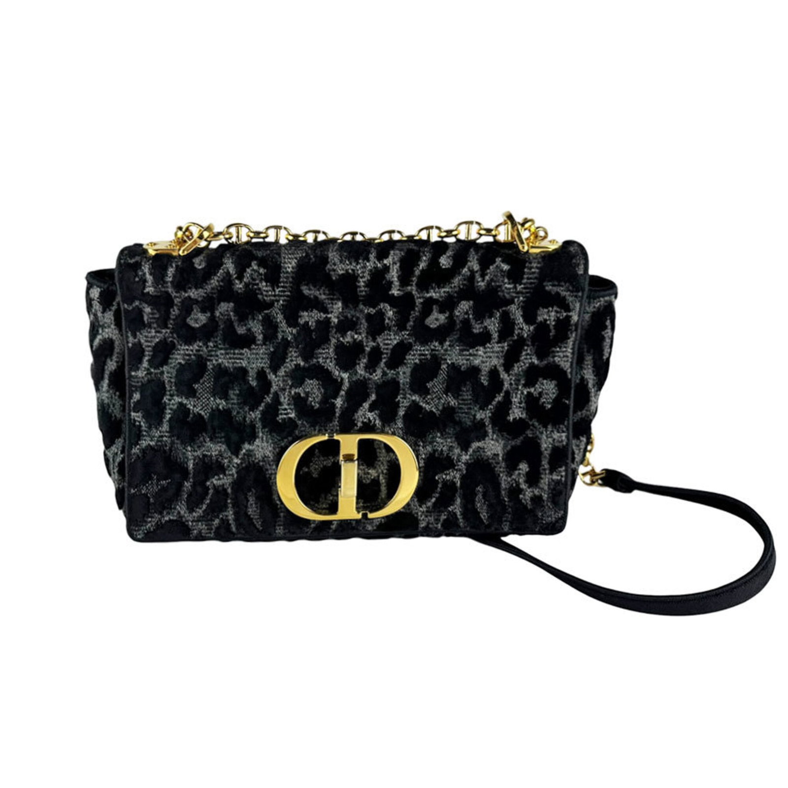 Shoulder Bag Velvet by Christian Dior: Shoulder Bag Velvet by Christian Dior Black velvet shoulder bag by Christian Dior, measuring 15cm x 25cm x 8cm. This luxurious bag features a striking velvet material and a sleek design, making it a