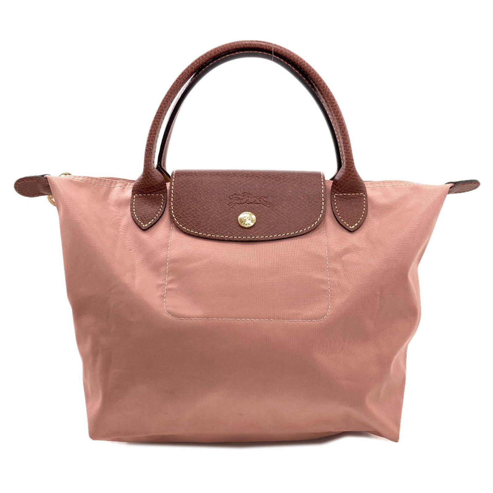 Nylon Longchamp Handbag: Nylon Longchamp Handbag Pink Nylon Longchamp Le Pliage Handbag, 24cm x 39.5cm x 13.5cm, features a durable nylon material and a signature that bears a mark. The bag's 26.5cm handle provides a