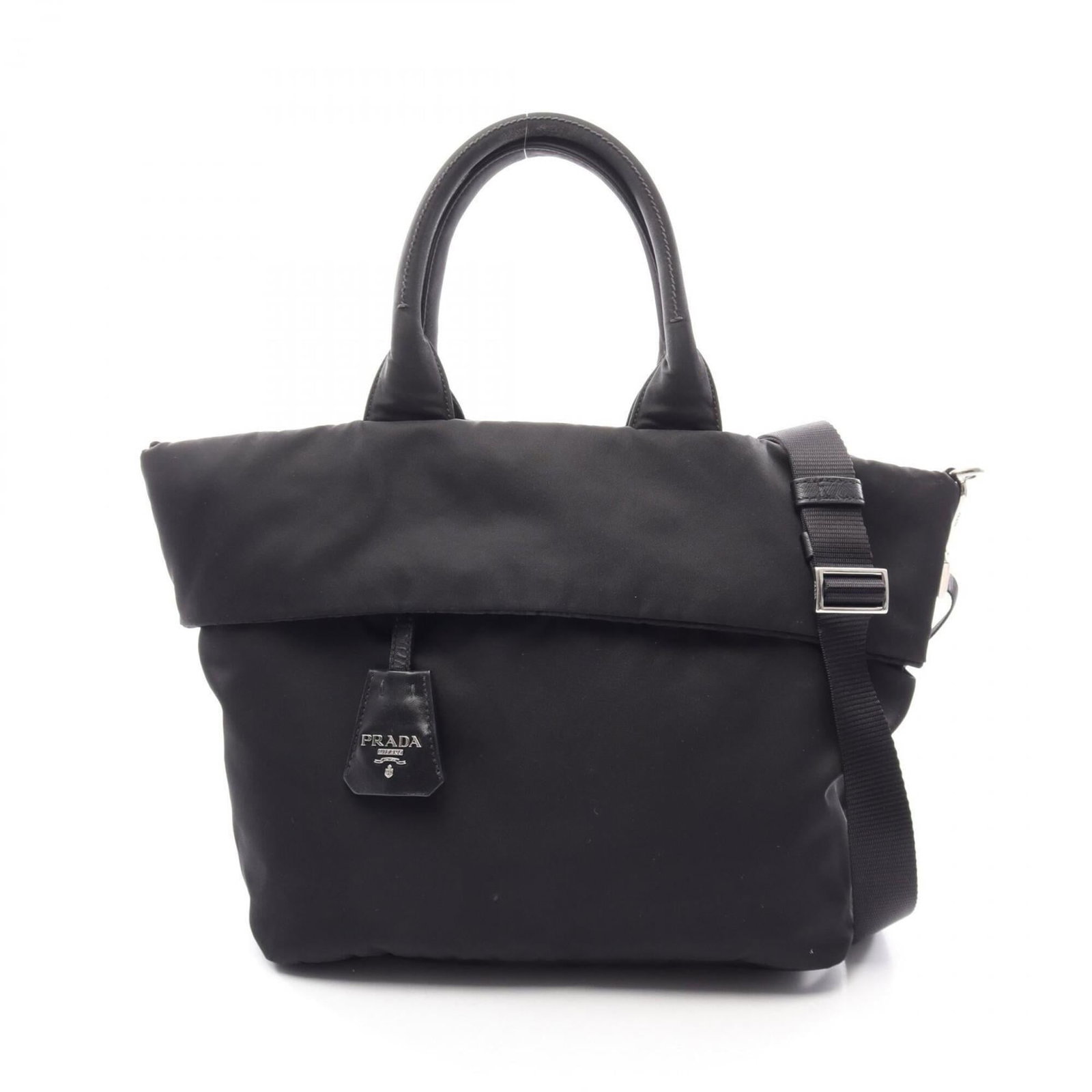Nylon Prada Handbag: Nylon Prada Handbag Black Nylon Prada Handbag, 25cm x 27cm x 16.5cm, bears a signature. Made from nylon, this women's handbag features a sleek design with a black color. The bag's compact size and