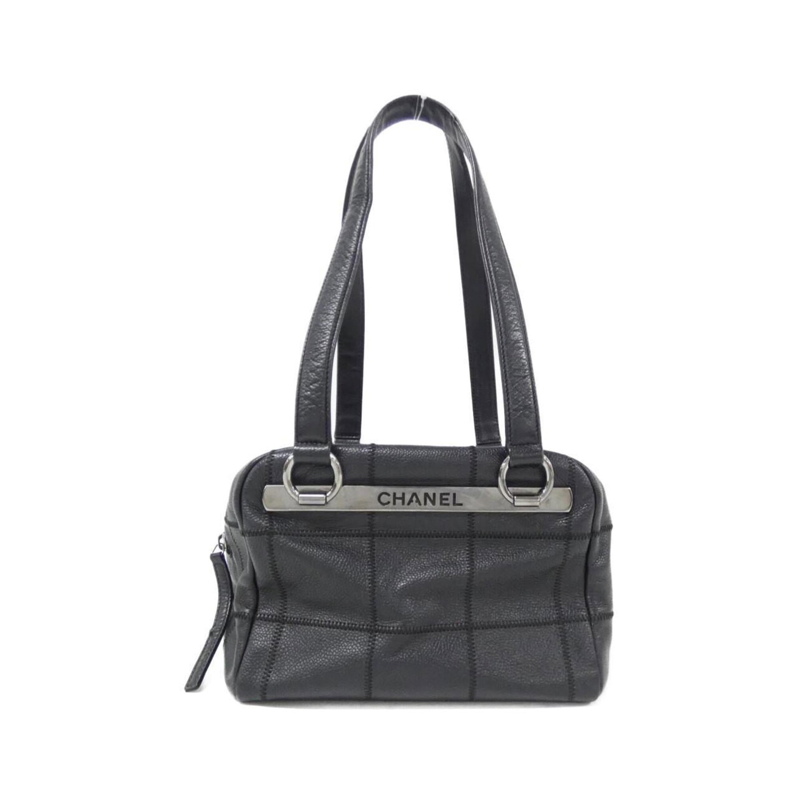 Calfskin Grained Chanel Bag Shoulder: Calfskin Grained Chanel Bag Shoulder This black Grained Calfskin Chanel shoulder bag features a classic design with clean lines and a timeless silhouette. With its 16cm x 22cm x 14cm dimensions, it's