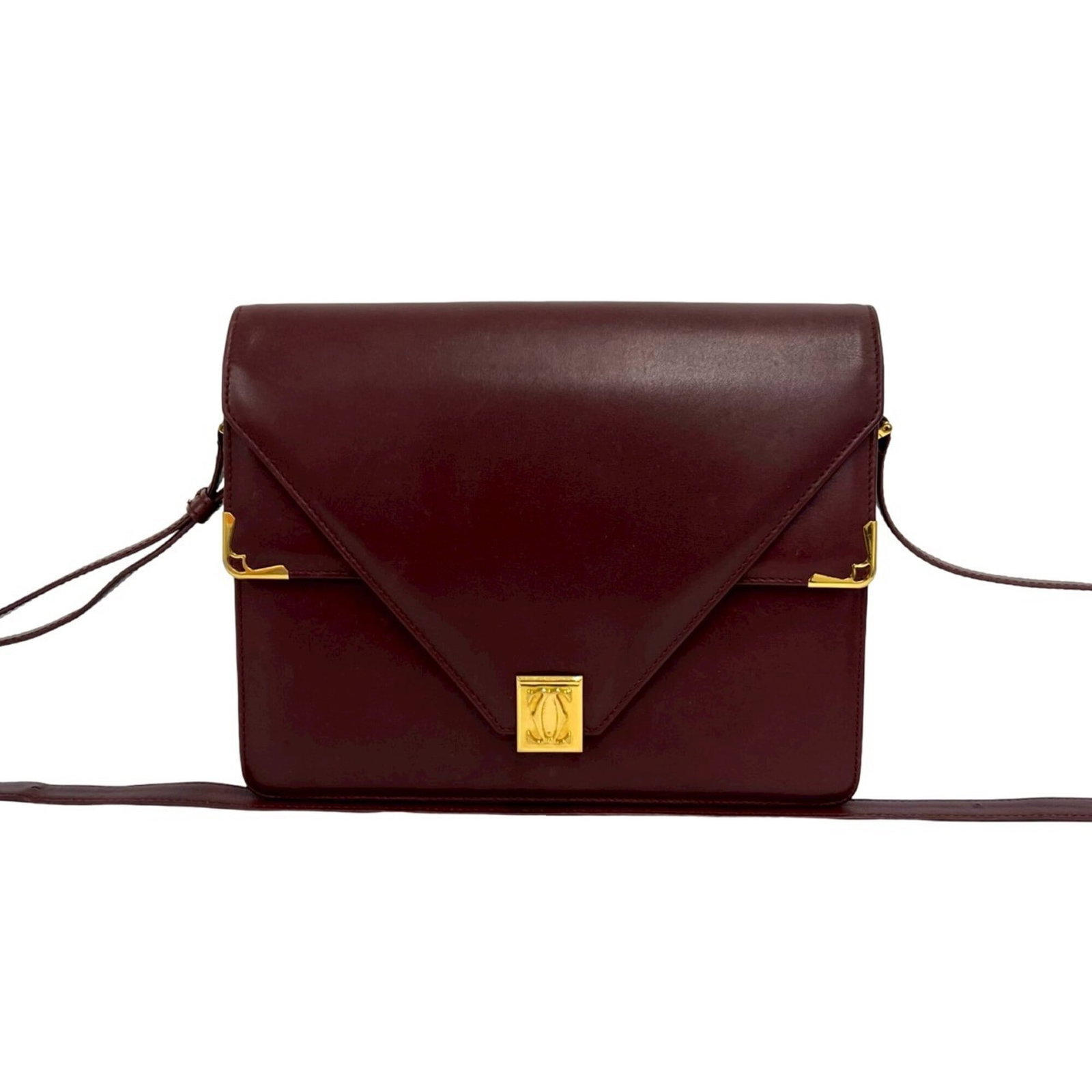 Shoulder Bag Leather Pochette Cartier: Shoulder Bag Leather Pochette Cartier Wine red leather, a classic Cartier pochette design, adds a touch of sophistication to any outfit. With its 19cm x 24cm x 3cm dimensions, this shoulder bag is