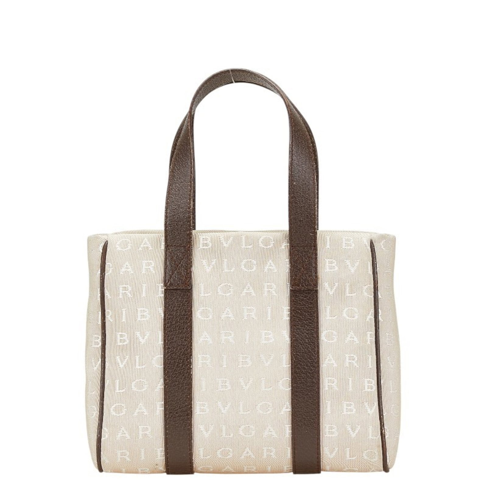 Canvas Leather Handbag Bvlgari: Canvas Leather Handbag Bvlgari Canvas Leather Bvlgari Handbag in Beige and Brown. This canvas leather handbag features a unique combination of materials and a classic design. With its 17cm x 23cm x