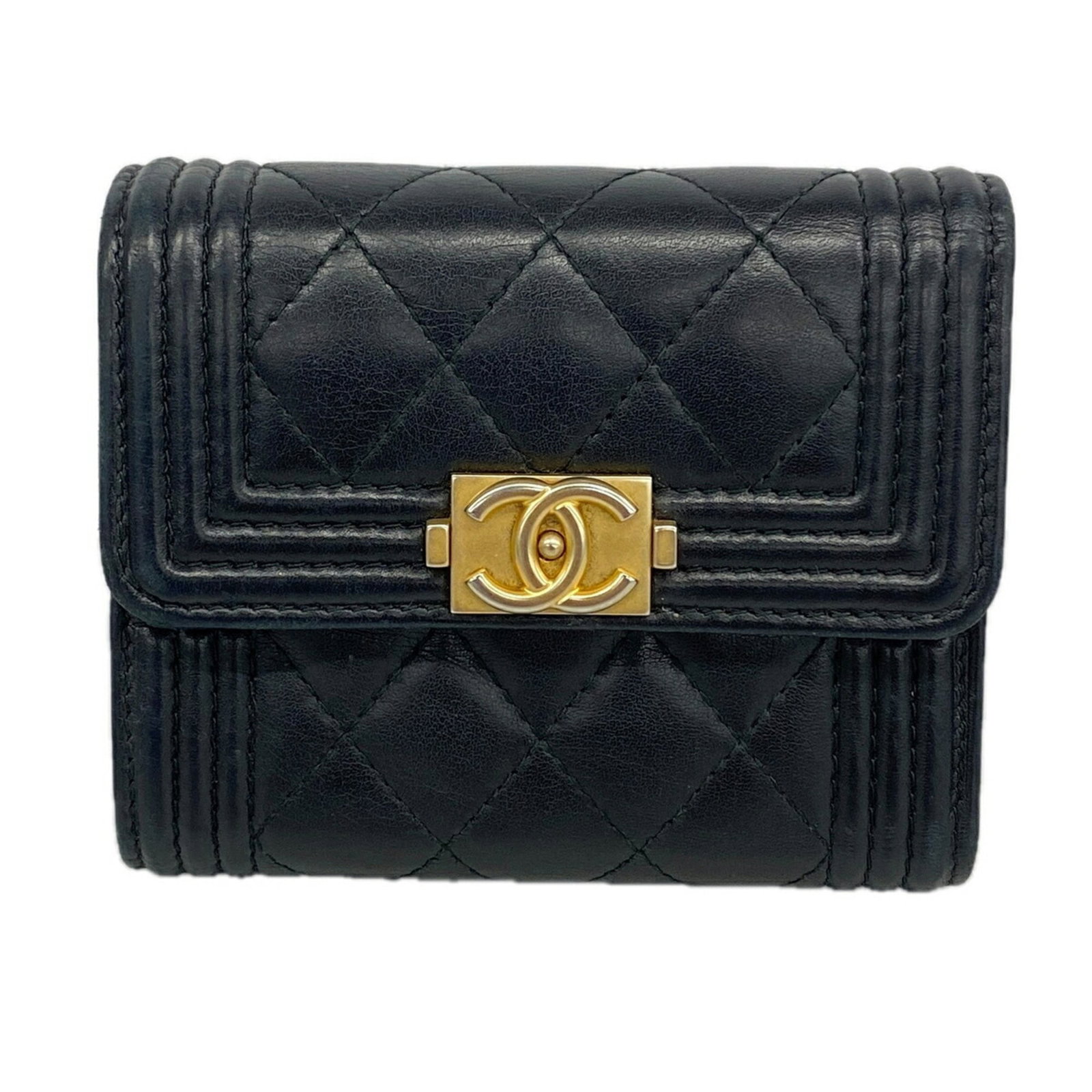 Chanel Wallet (Tri-Fold) Leather: Chanel Wallet (Tri-Fold) Leather Tri-fold leather wallet from iconic French fashion brand Chanel, crafted from high-quality lambskin in sleek black. Measuring 9cm x 10.5cm x 3cm, this stylish wallet i