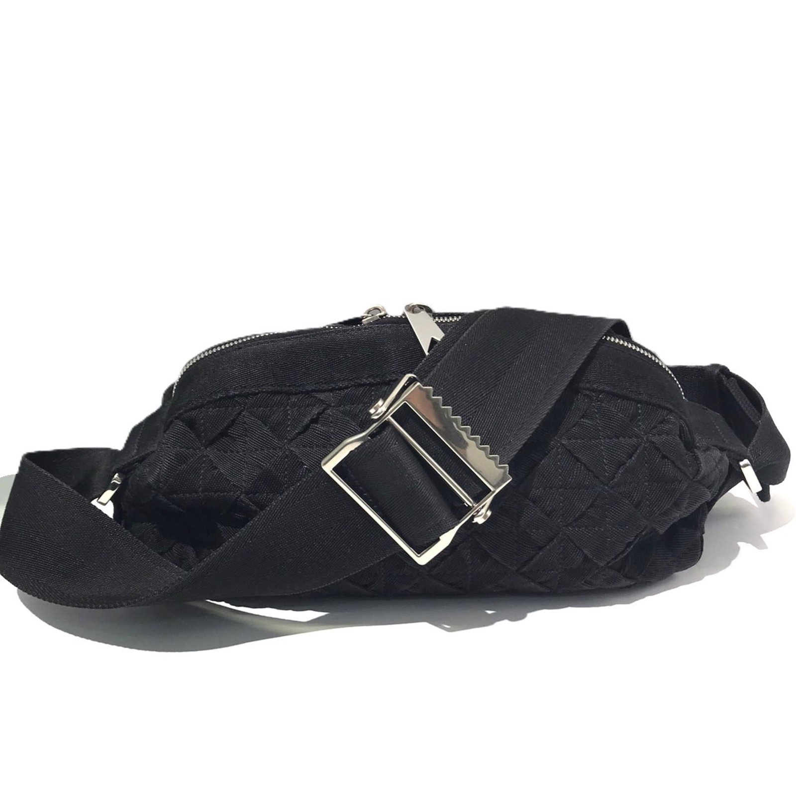 Intrecciato sling bag by Bottega Veneta: Intrecciato sling bag by Bottega Veneta Intrecciato weave gives this Bottega Veneta sling bag its distinctive texture and visual interest, while the black color provides a sleek and versatile base.