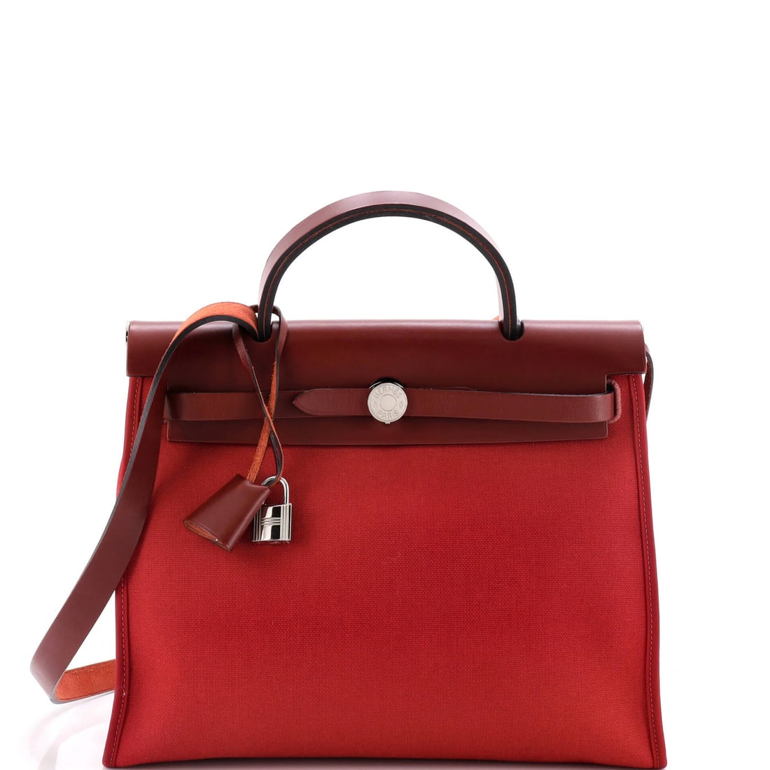 Herbag Hermes Leather Toile 31 Zip: Herbag Hermes Leather Toile 31 Zip Burgundy Herm?s Leather Toile 31 Zip Bag in Excellent Condition. This 31cm shoulder bag features a striking burgundy exterior with a classic Toile 31 design, paired