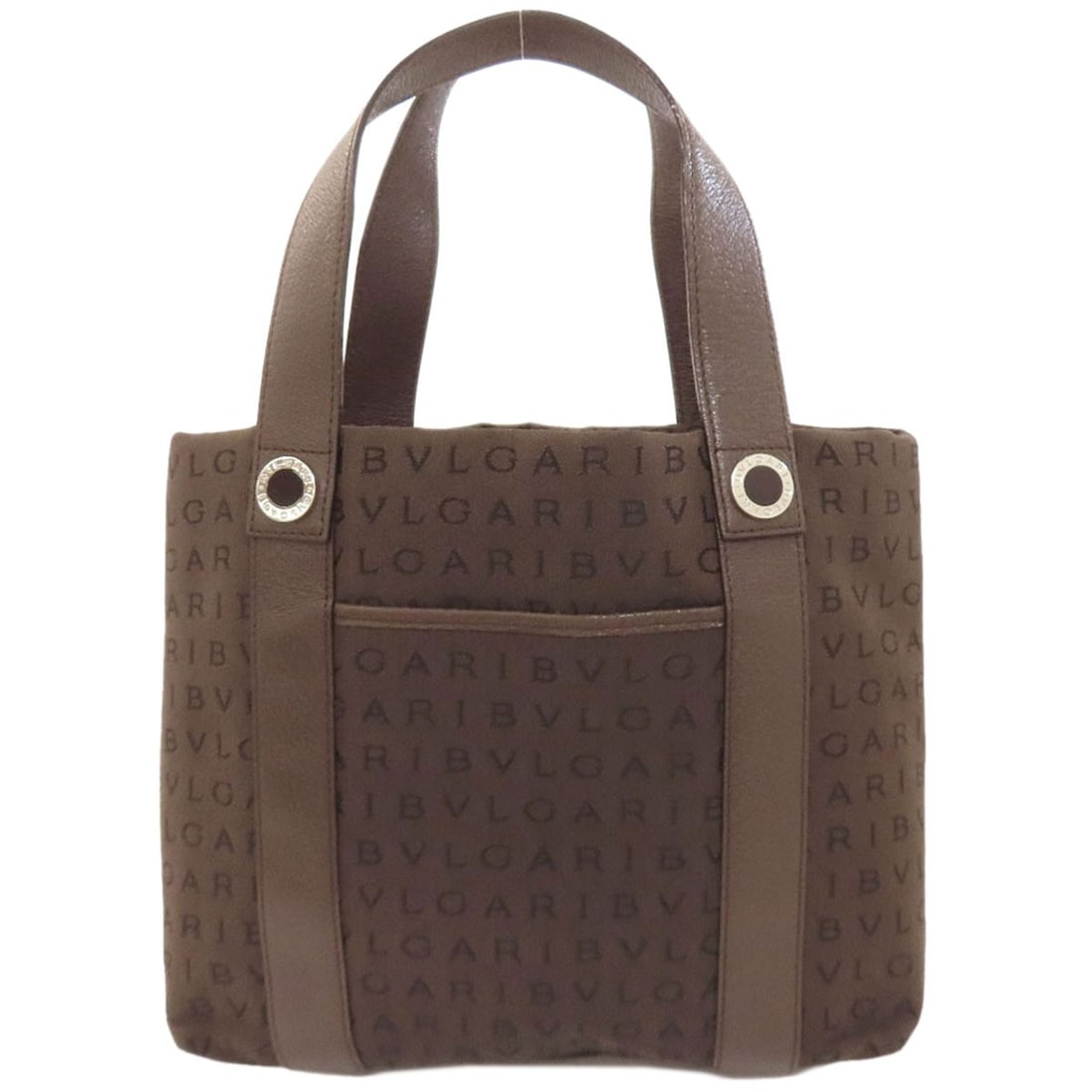 Logo Mania Bag Canvas by Bvlgari: Logo Mania Bag Canvas by Bvlgari Bvlgari's Logo Mania Bag Canvas is a stylish tote bag featuring a brown canvas exterior with a notable logo design. The bag's design showcases the brand's signature