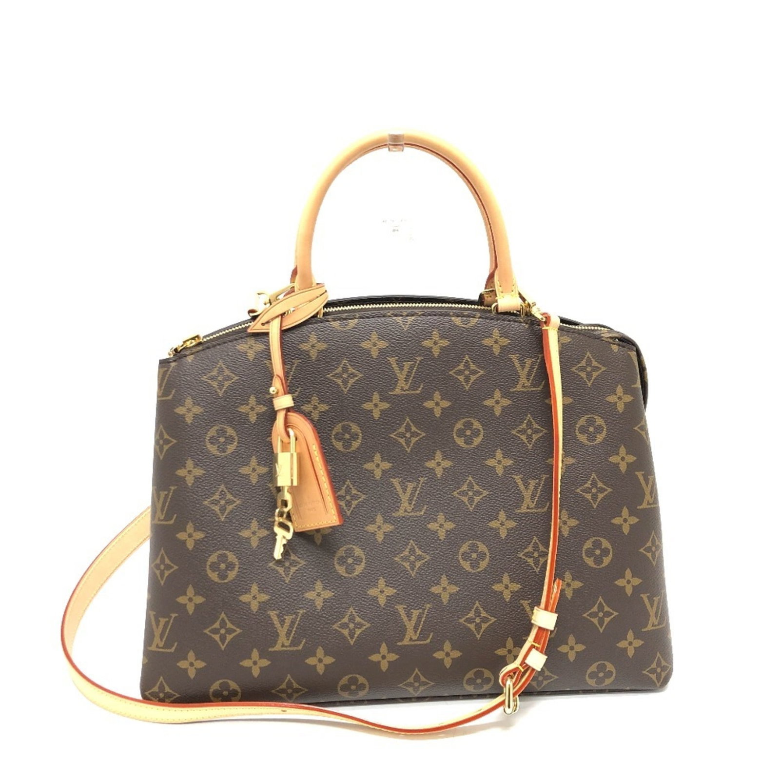 Louis Vuitton Monogram Handbag: Louis Vuitton Monogram Handbag The Louis Vuitton Monogram Grand Palais MM handbag boasts a classic design with a timeless Monogram pattern in rich brown, galle, and red hues. This iconic bag features