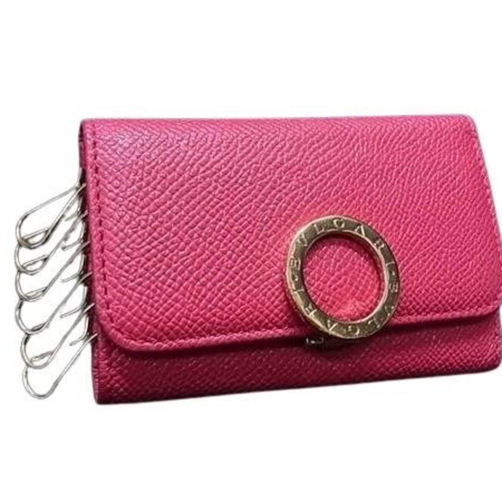 Bvlgari leather keycase: Bvlgari leather keycase Pink Bvlgari leather keycase, made from high-quality calfskin, features a sleek and stylish design. With its compact size and durable construction, this keycase is perfect for 