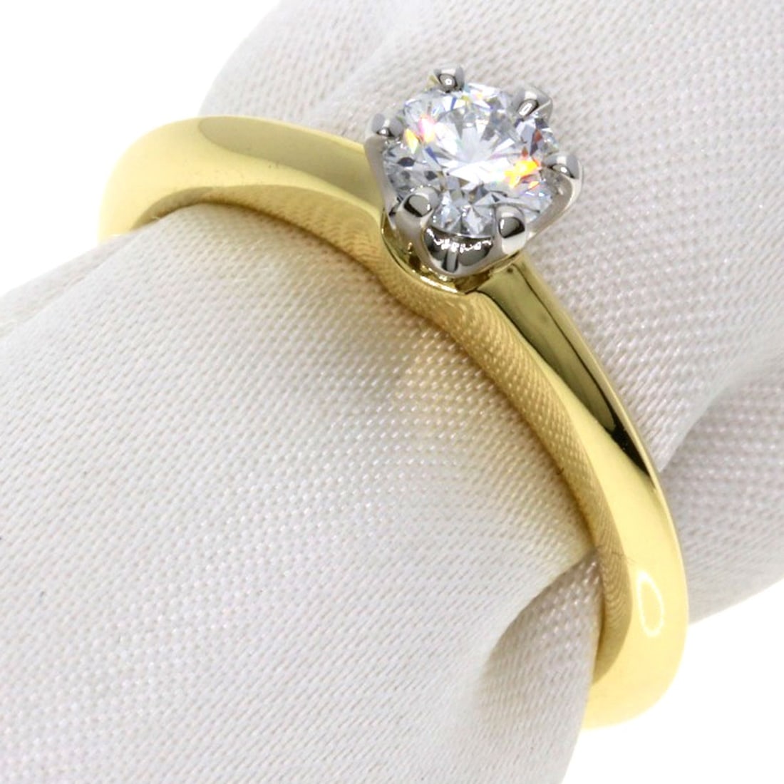 Solitaire Diamond Ring Tiffany Co K18 Yellow Gold Pt950: Solitaire Diamond Ring Tiffany Co K18 Yellow Gold Pt950 K18 Yellow Gold Pt950 solitaire diamond ring from Tiffany & Co. showcases a stunning gold setting that highlights a beautiful diamond. The 4.25 
